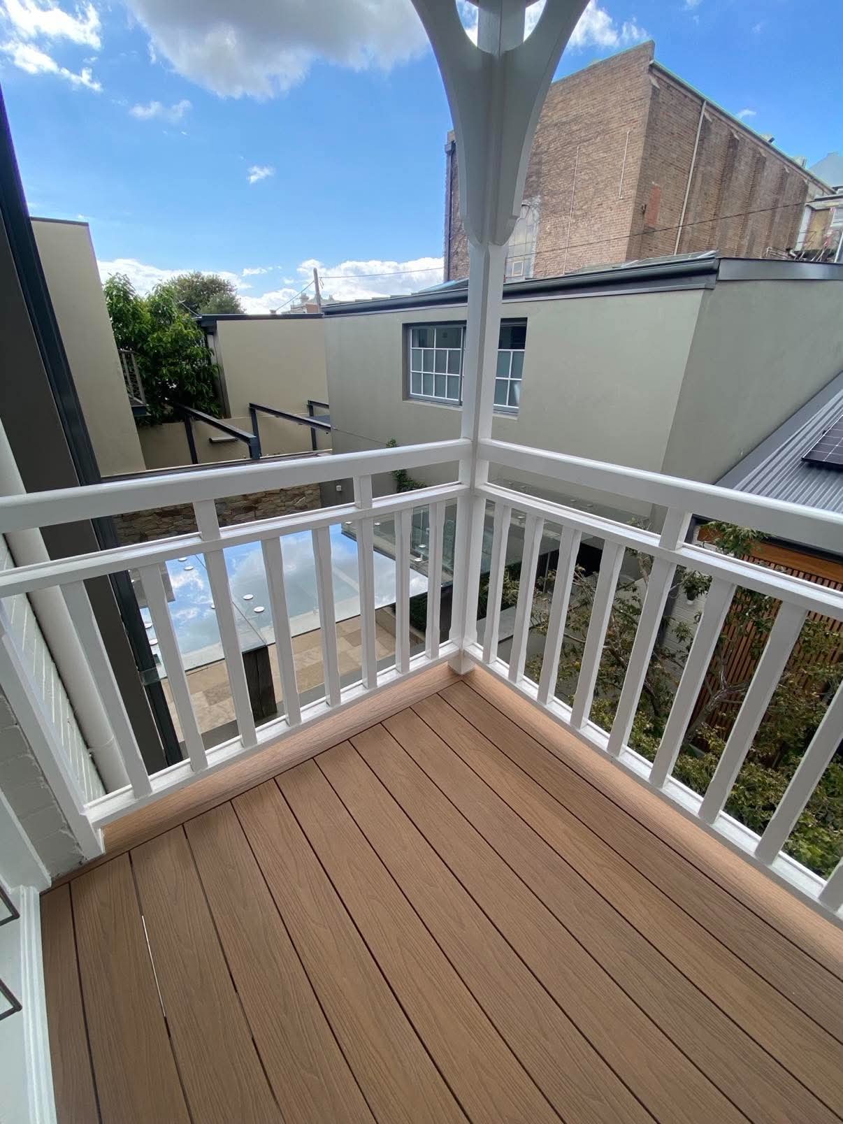 Balcony deck with white balustrade