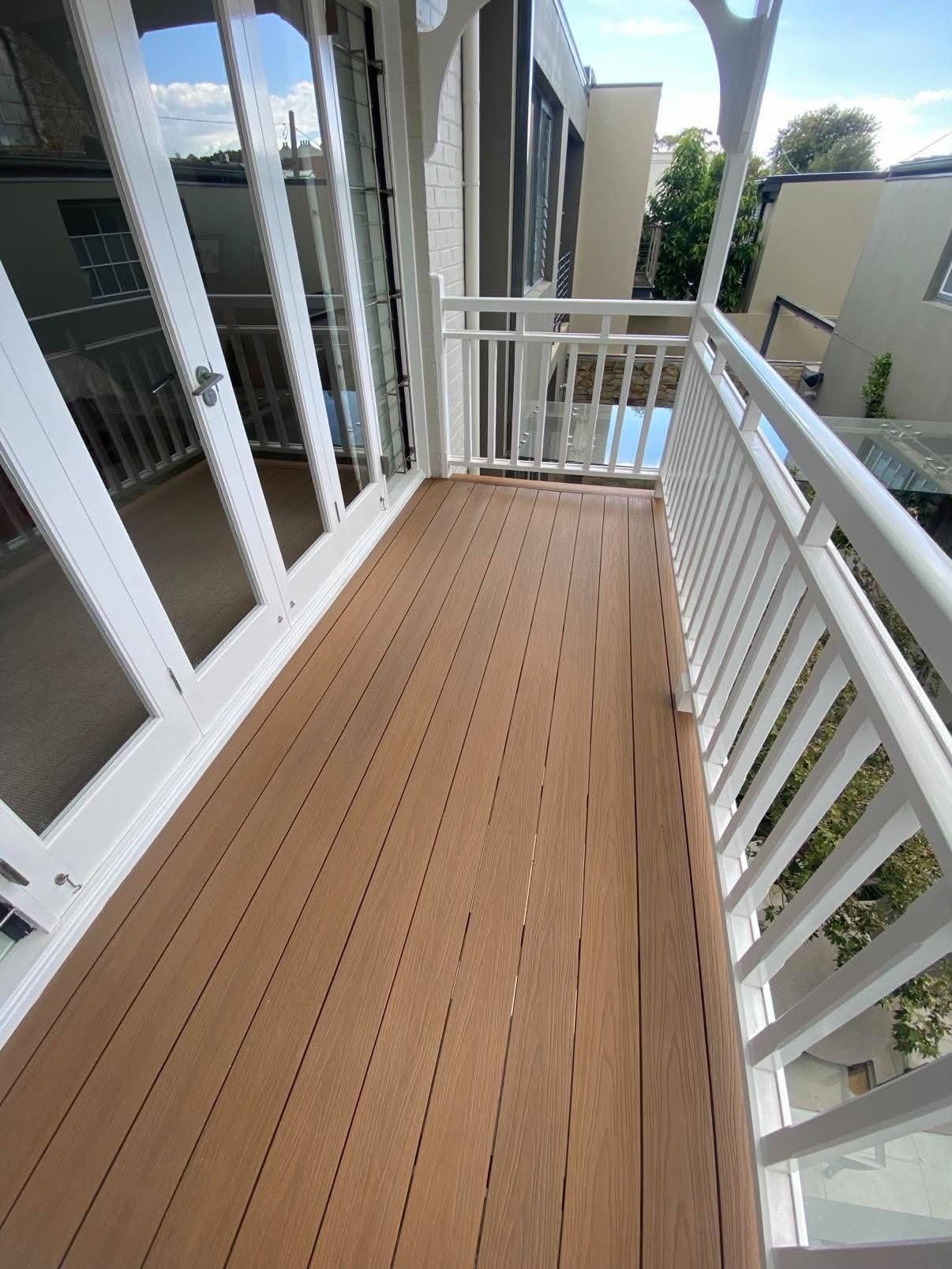 Backyard composite deck with balustrade