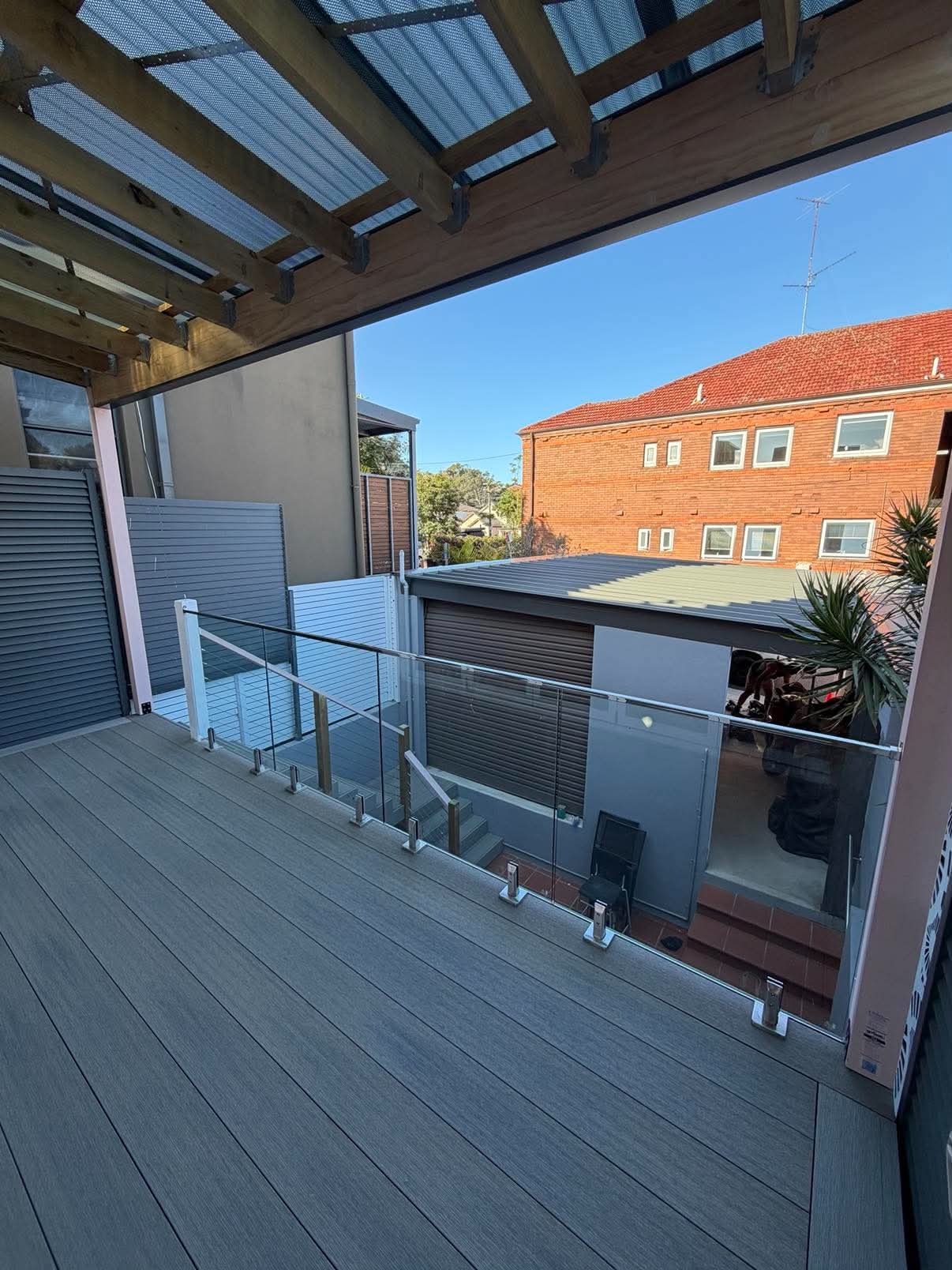 Wide balcony deck with timber-look boards