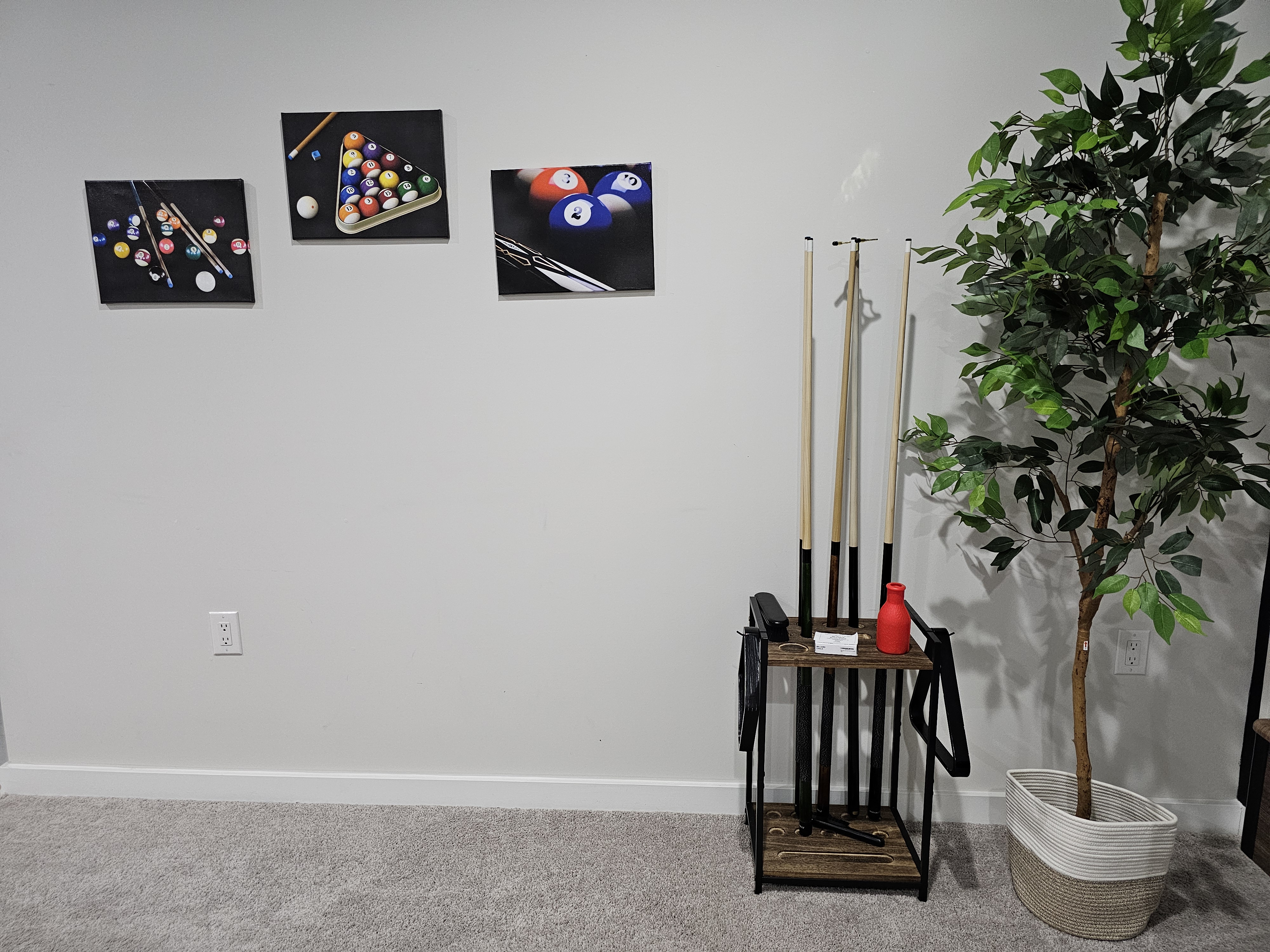 Pool stick rack — return cues and chalk here when not in use