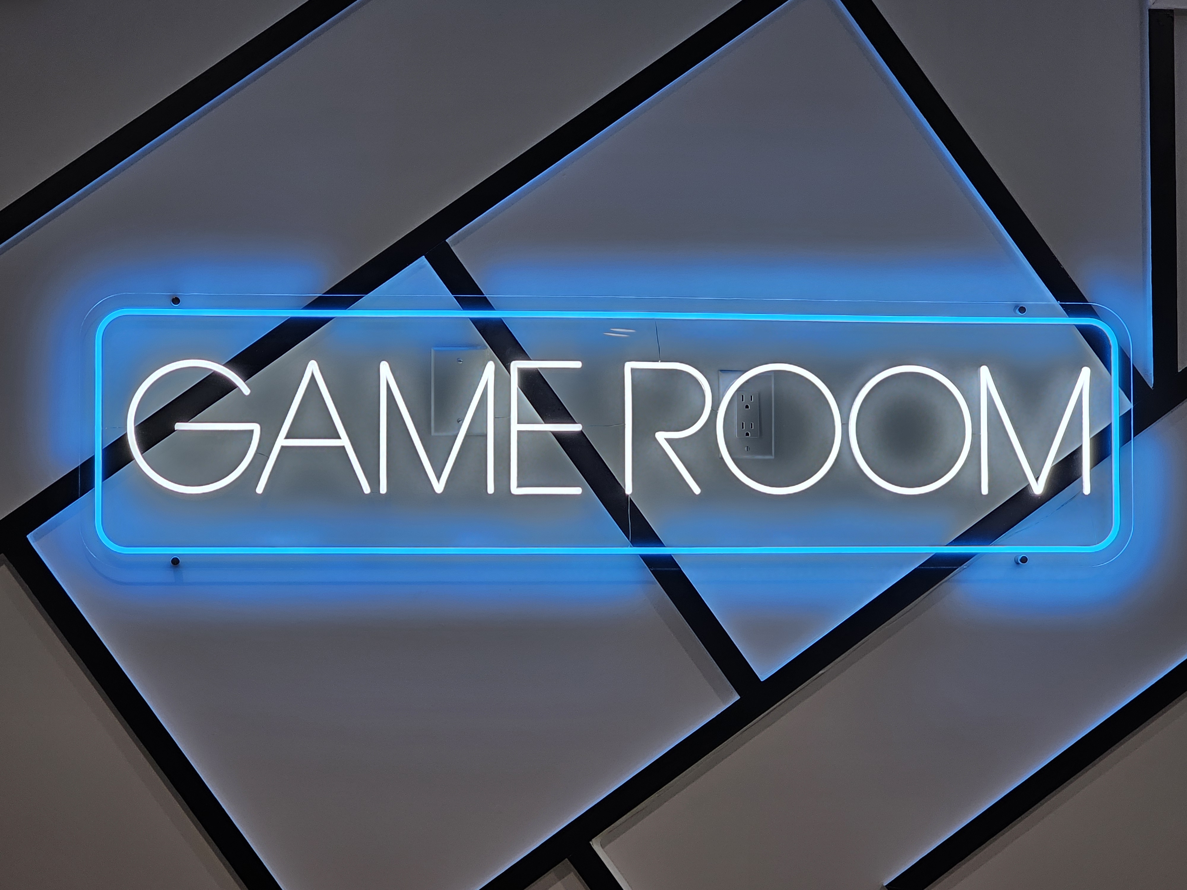 Game room sign — time controlled equipment, do not touch or unplug