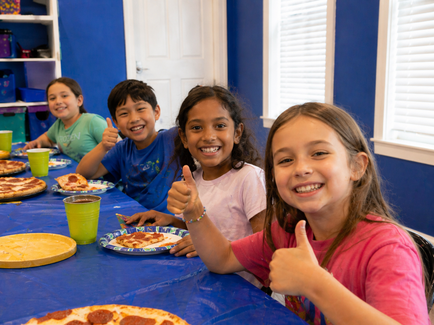 Kids having fun at a pizza party