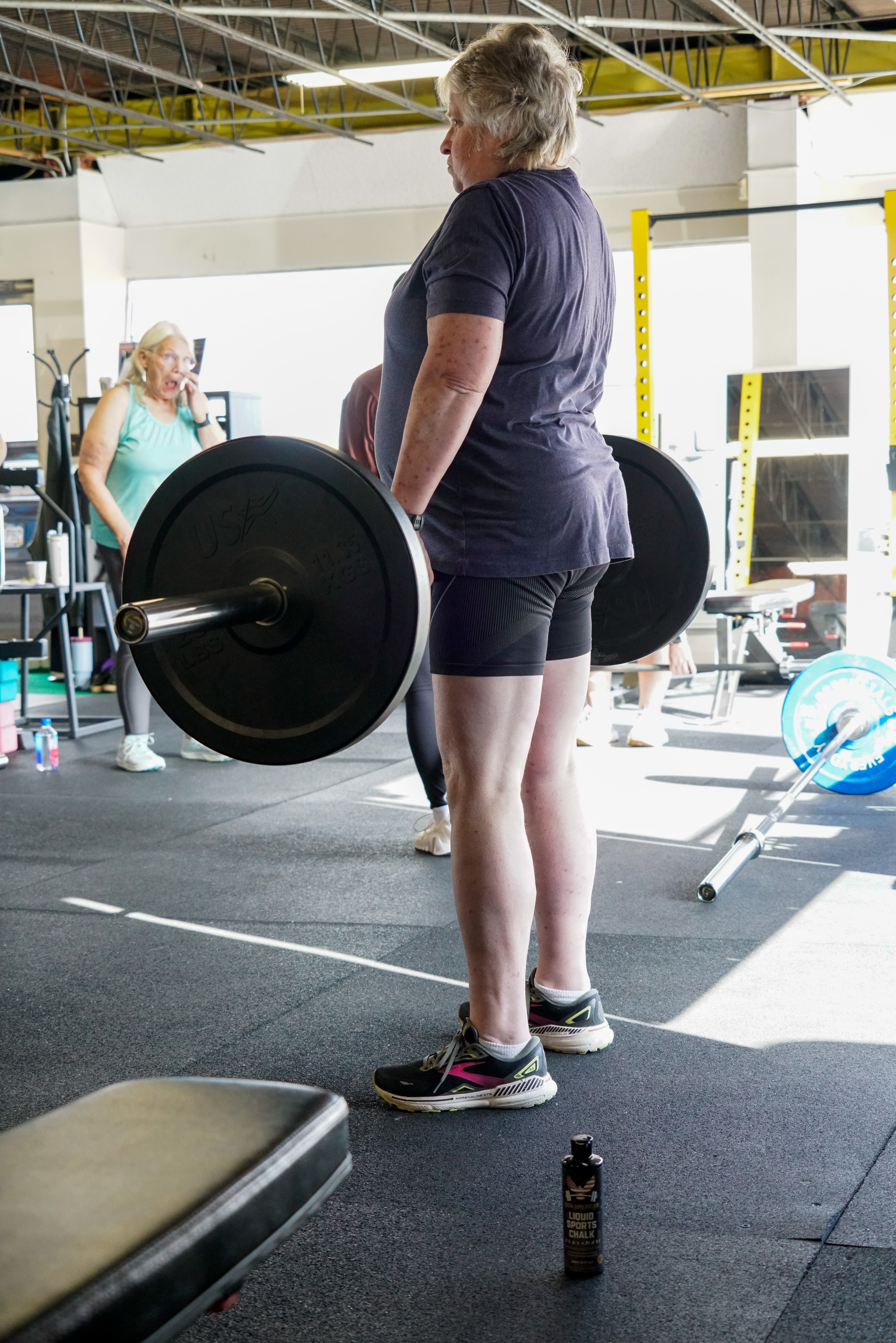 FYSF member performing a barbell lift on the platform