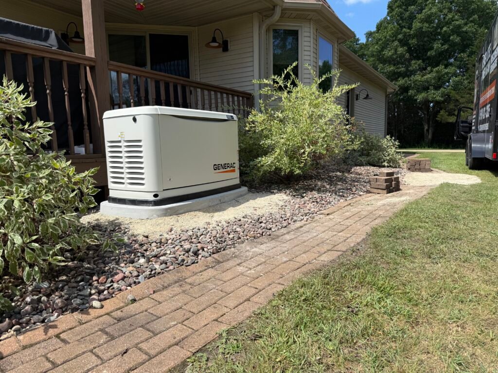 A standby generator installed beside a Wisconsin home
