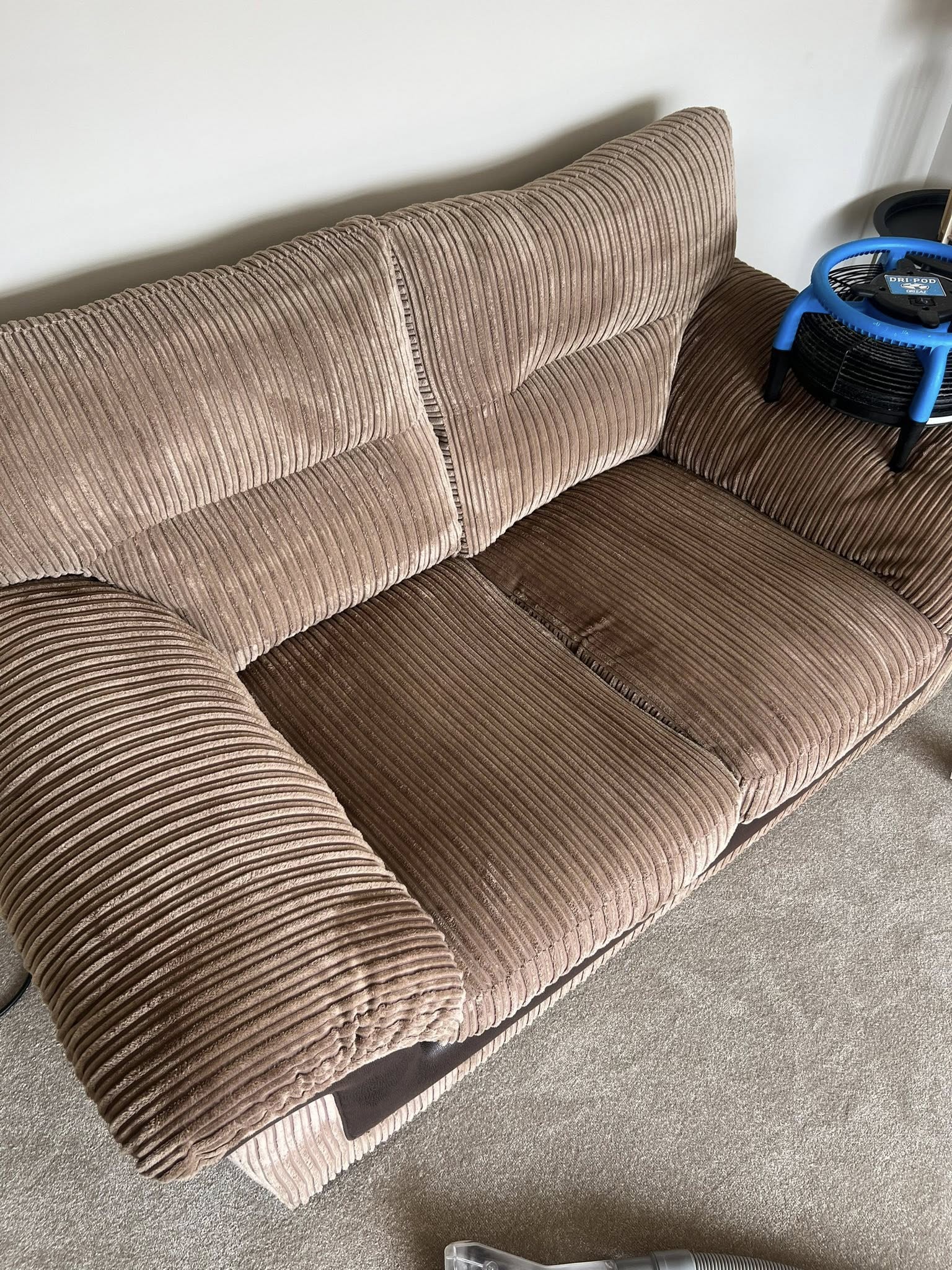 freshly cleaned microfibre 2 seater sofa in home that the homeowner is clearly proud of