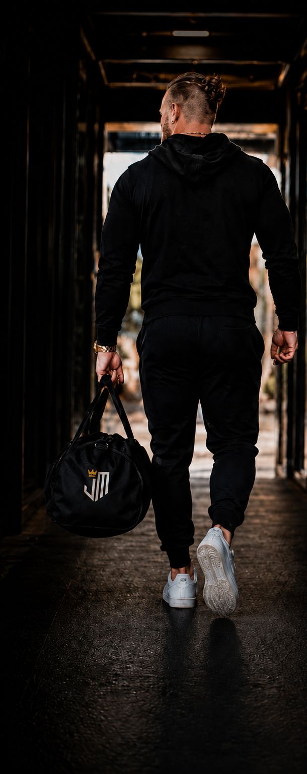 Jeffery Mercier walking down a dark corridor toward the light