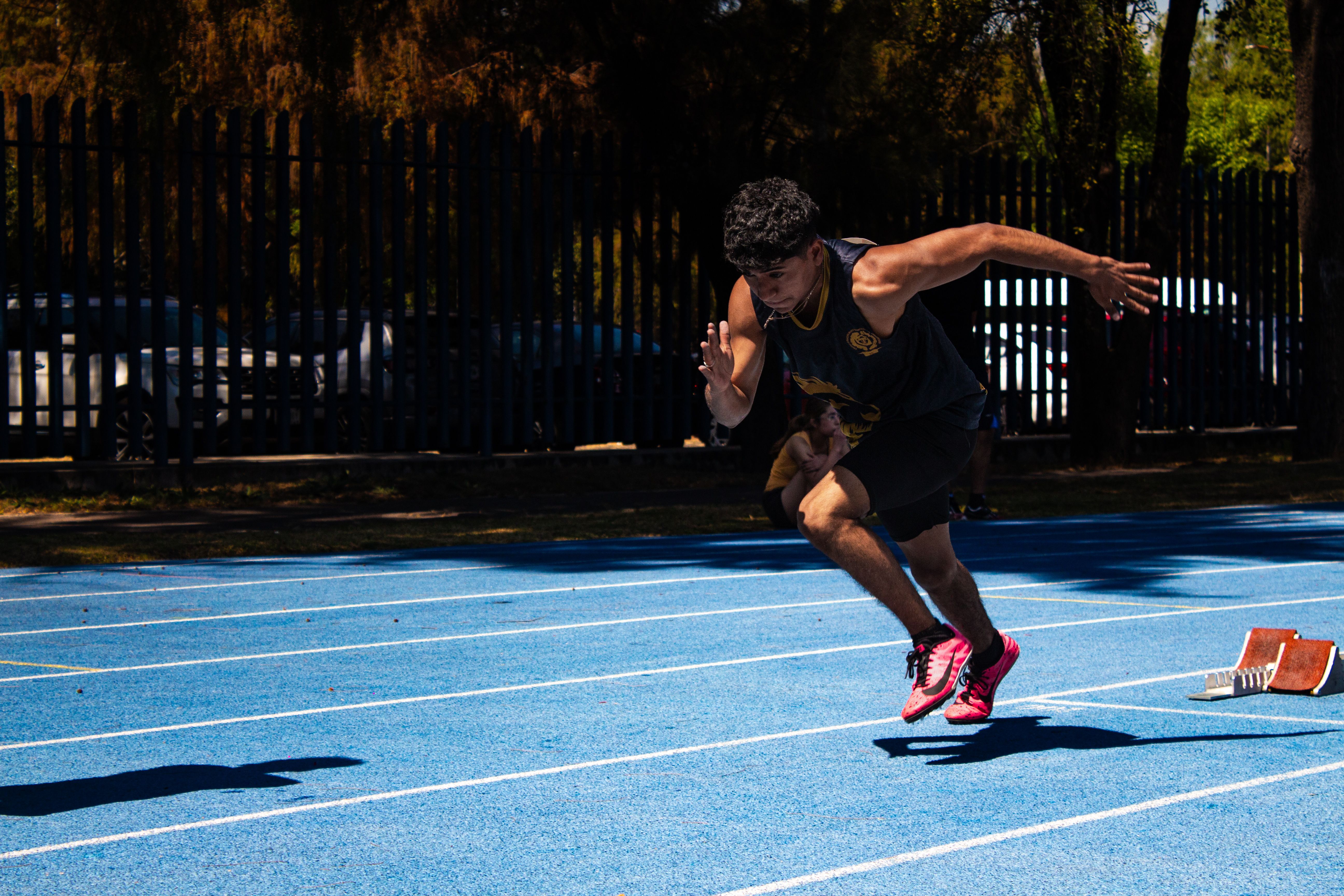 Athlete sprinting on track