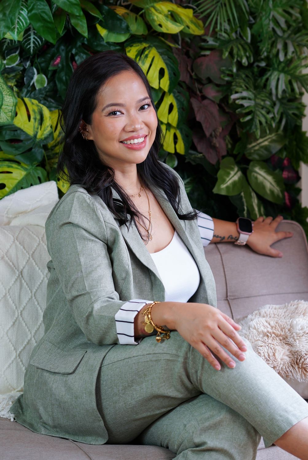 Annikka seated on a sofa