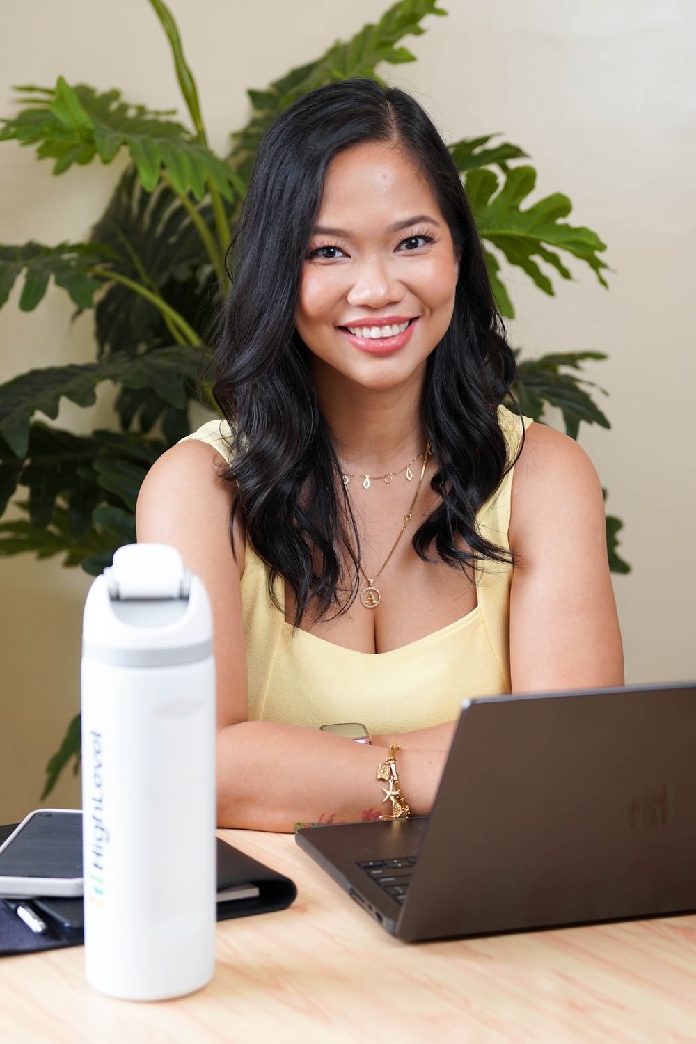 Annikka smiling at her desk