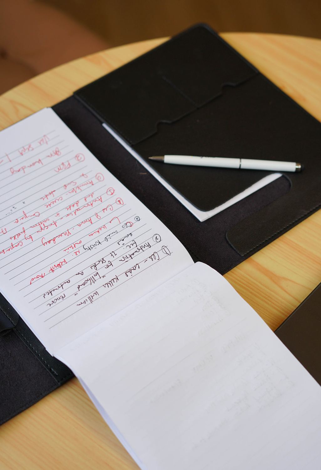 Notebook and planner on a desk