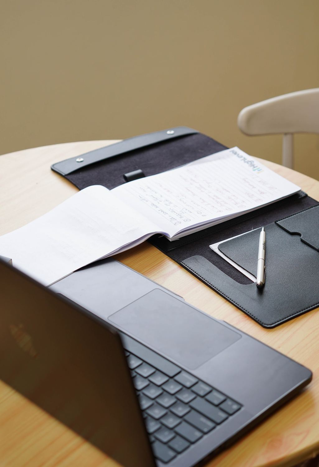Planner and keyboard on a desk