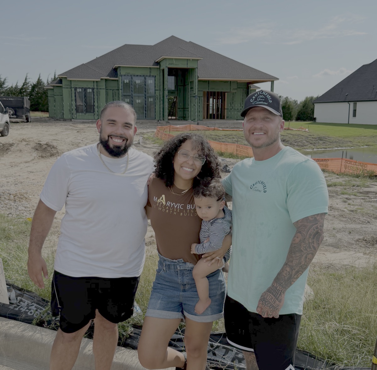 Maryvic and Nelson on-site with their baby in Heath, TX