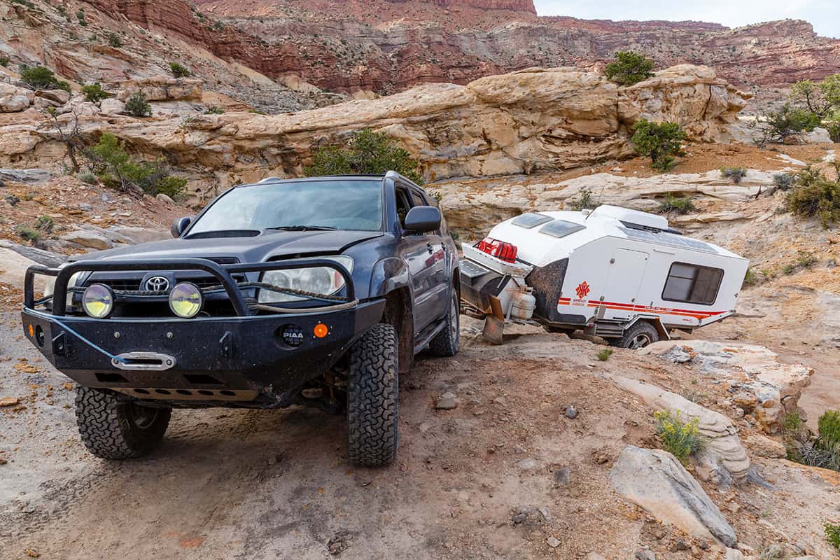 Karavan travelling over rugged terrain