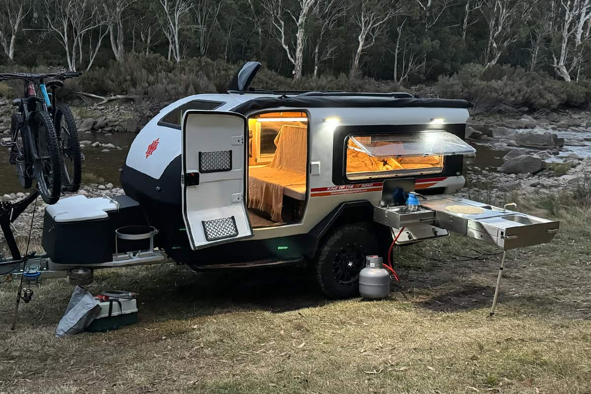 Kube campsite beside a creek