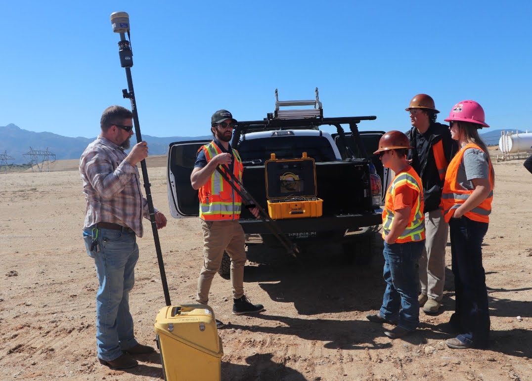 Surveying equipment with detailed property plat map for a Las Vegas land survey project