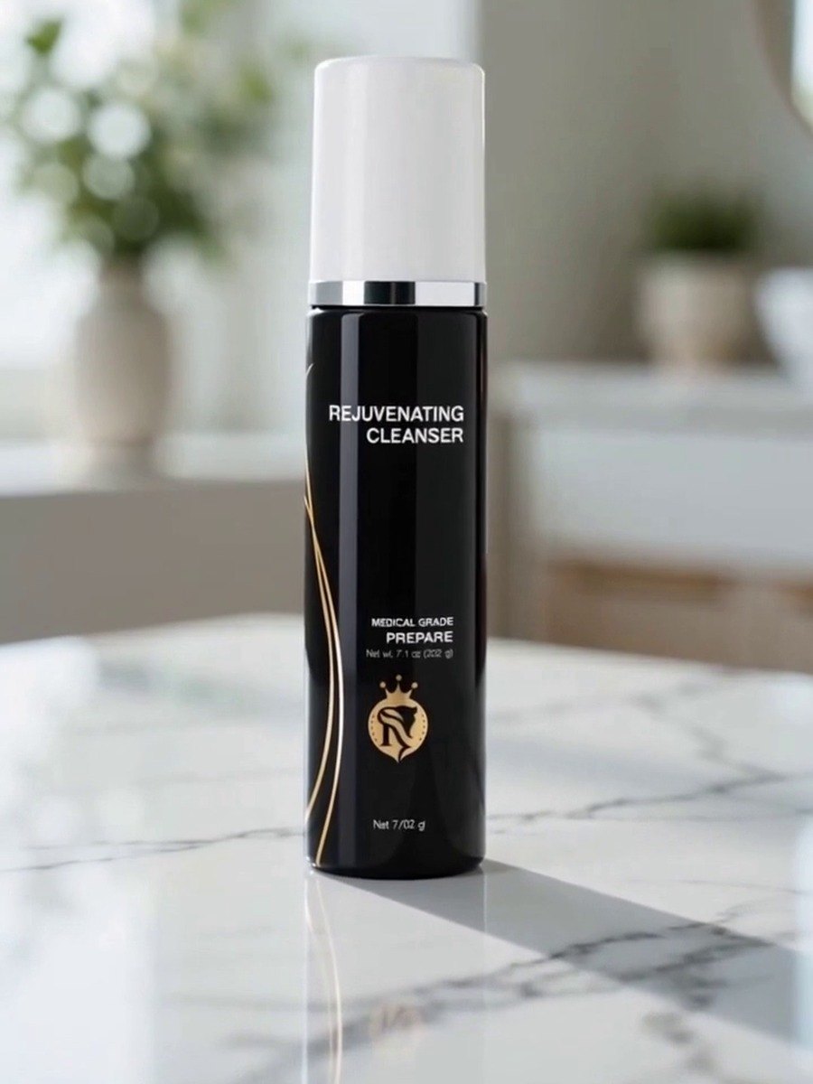 Queens & Kings Rejuvenating Cleanser bottle on marble