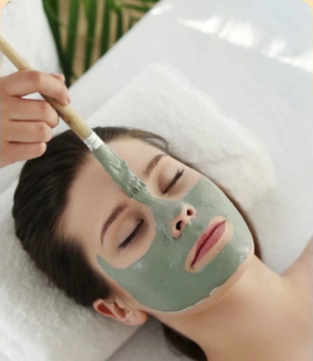 A facial treatment in progress at Queens & Kings Wellness Lounge