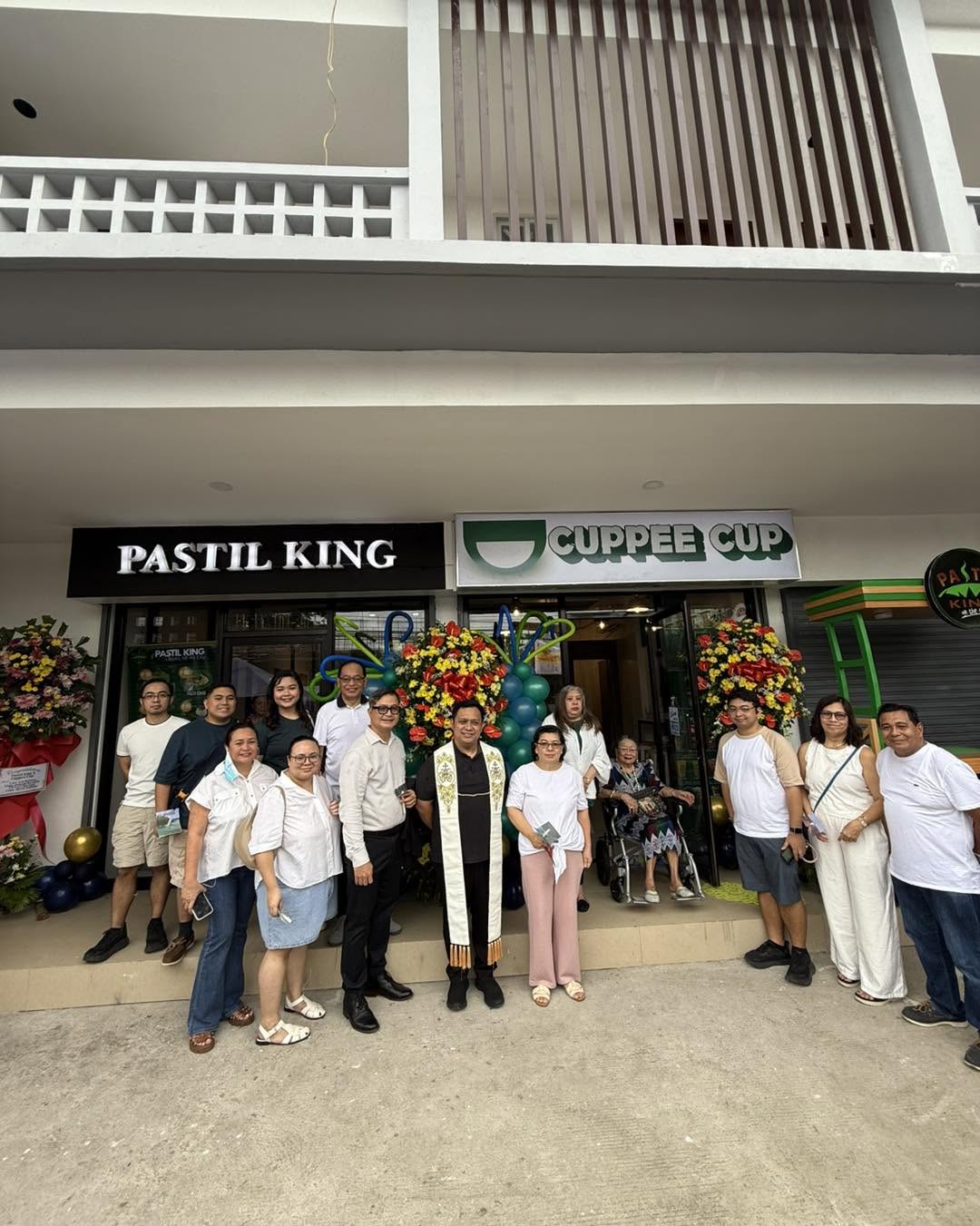 Pastil King business in action — complete food cart, uniformed staff, and customers ordering