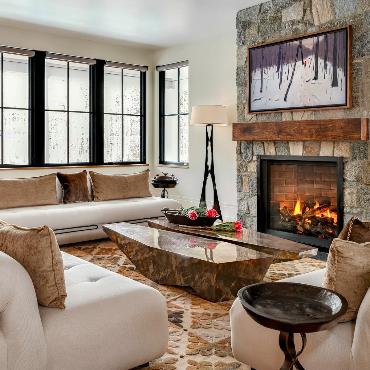 Professionally painted living room interior by Minute Men Painters in Portsmouth, New Hampshire featuring a stone fireplace and neutral color palette