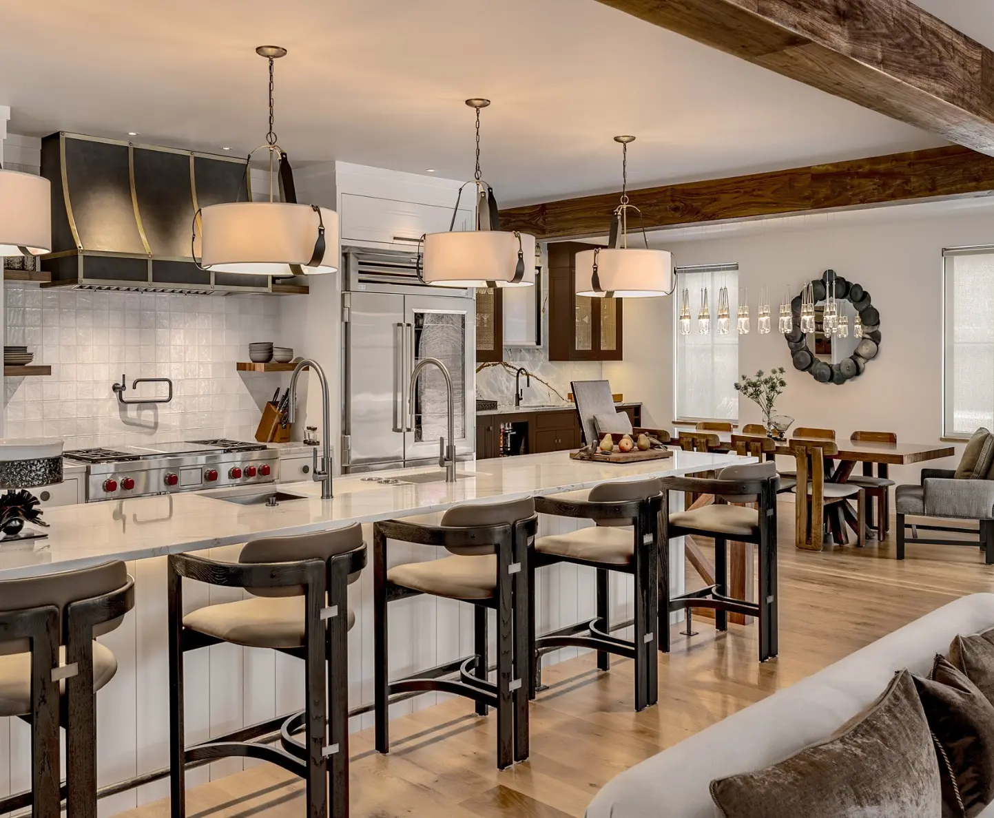 Professionally painted kitchen interior by Minute Men Painters in Portsmouth, New Hampshire featuring a modern island and wood accents