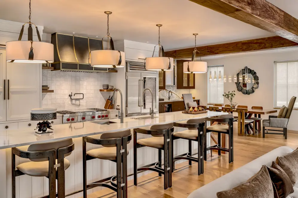 Interior kitchen painting by Minute Men Painters in Portsmouth, New Hampshire featuring a modern open-concept kitchen with island seating