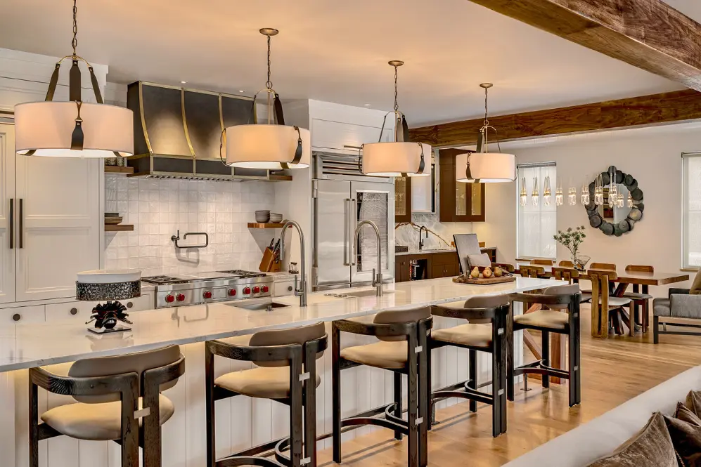 Professionally painted kitchen interior by Minute Men Painters in Portsmouth, New Hampshire featuring a modern island and wood accents