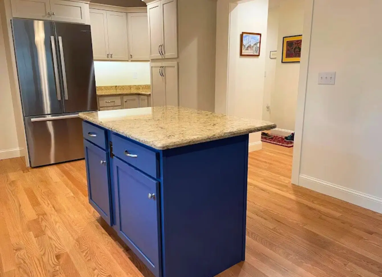 Kitchen repaint and cabinet refresh by Minute Men Painters in Portsmouth, New Hampshire with freshly painted cabinetry and walls