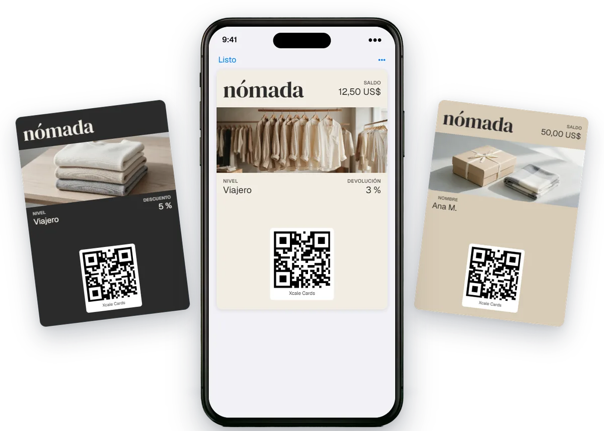 Un iPhone con la tarjeta de devolución de dinero de Nómada en el Wallet, entre su tarjeta de descuento y su tarjeta de regalo.