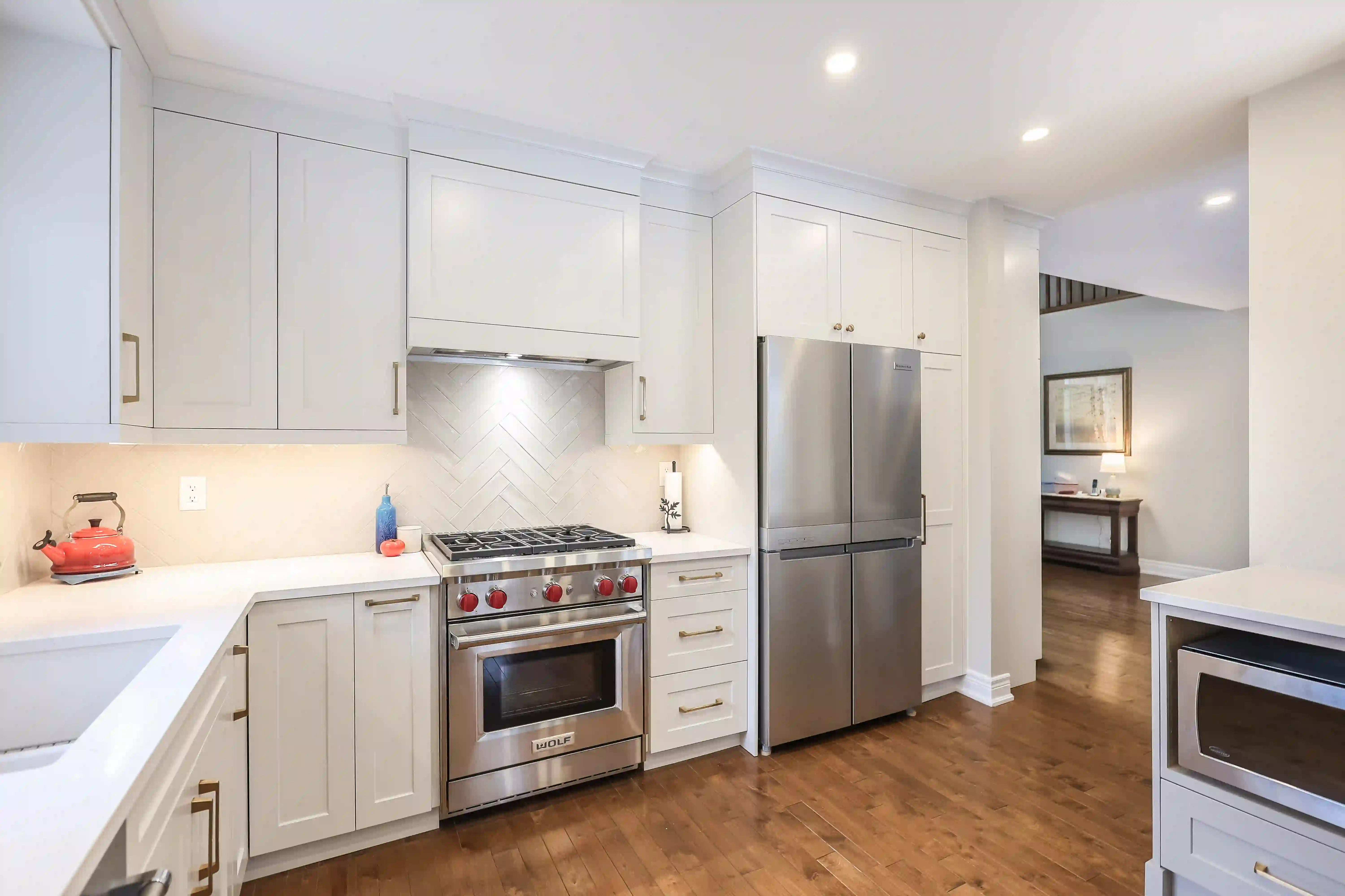 Kitchen range and refrigerator view