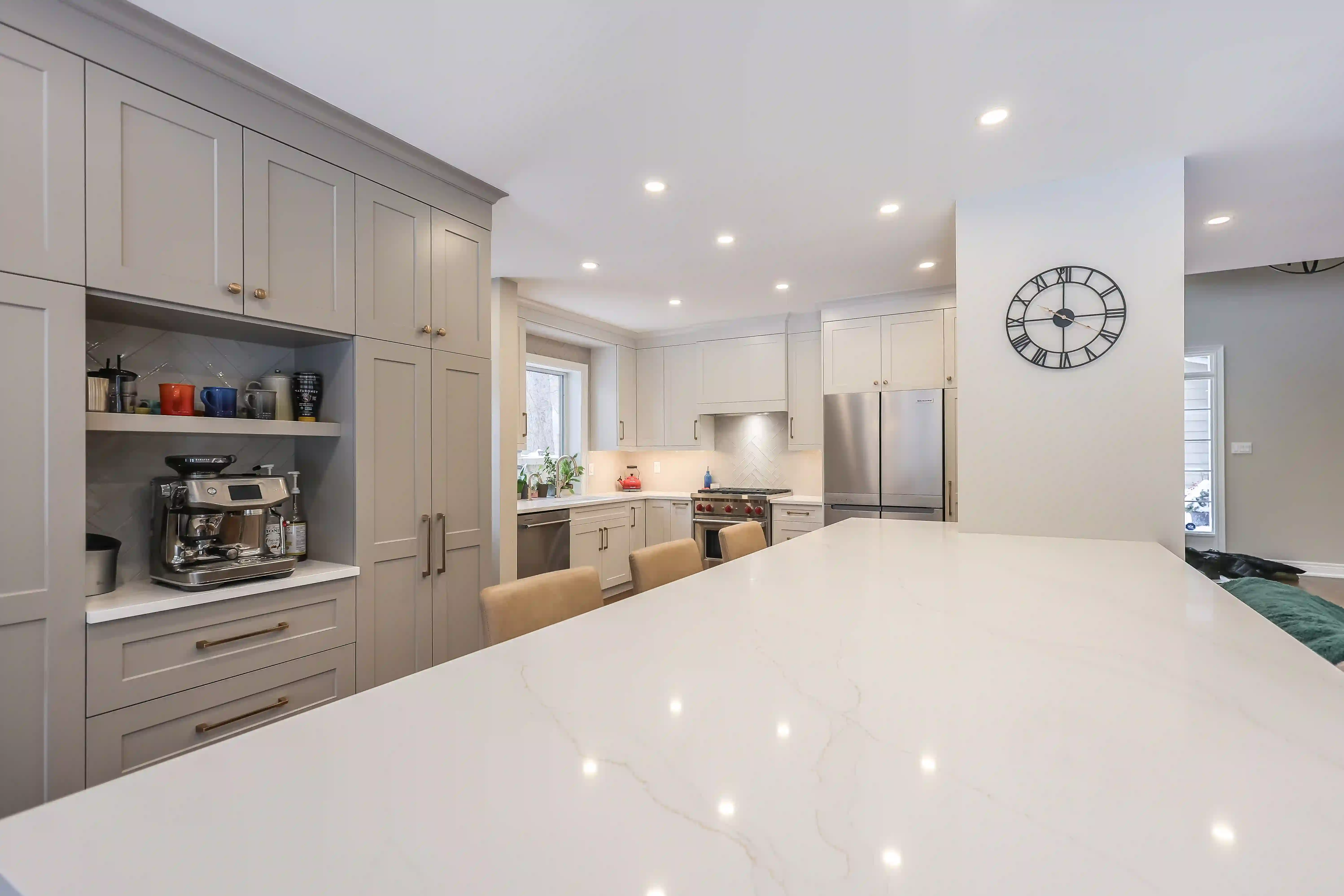 Kitchen island and pantry wall