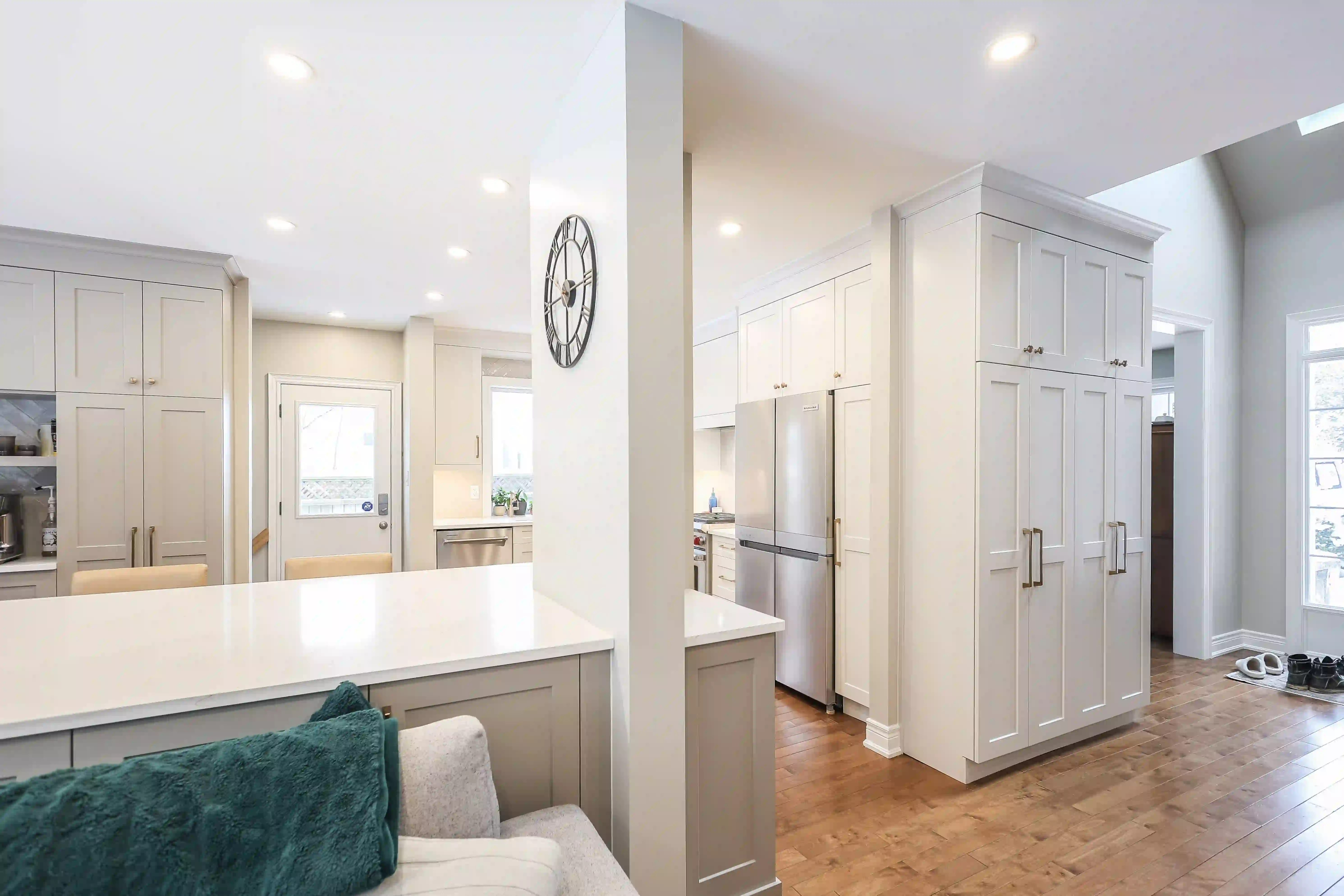 Kitchen island, pantry wall and range