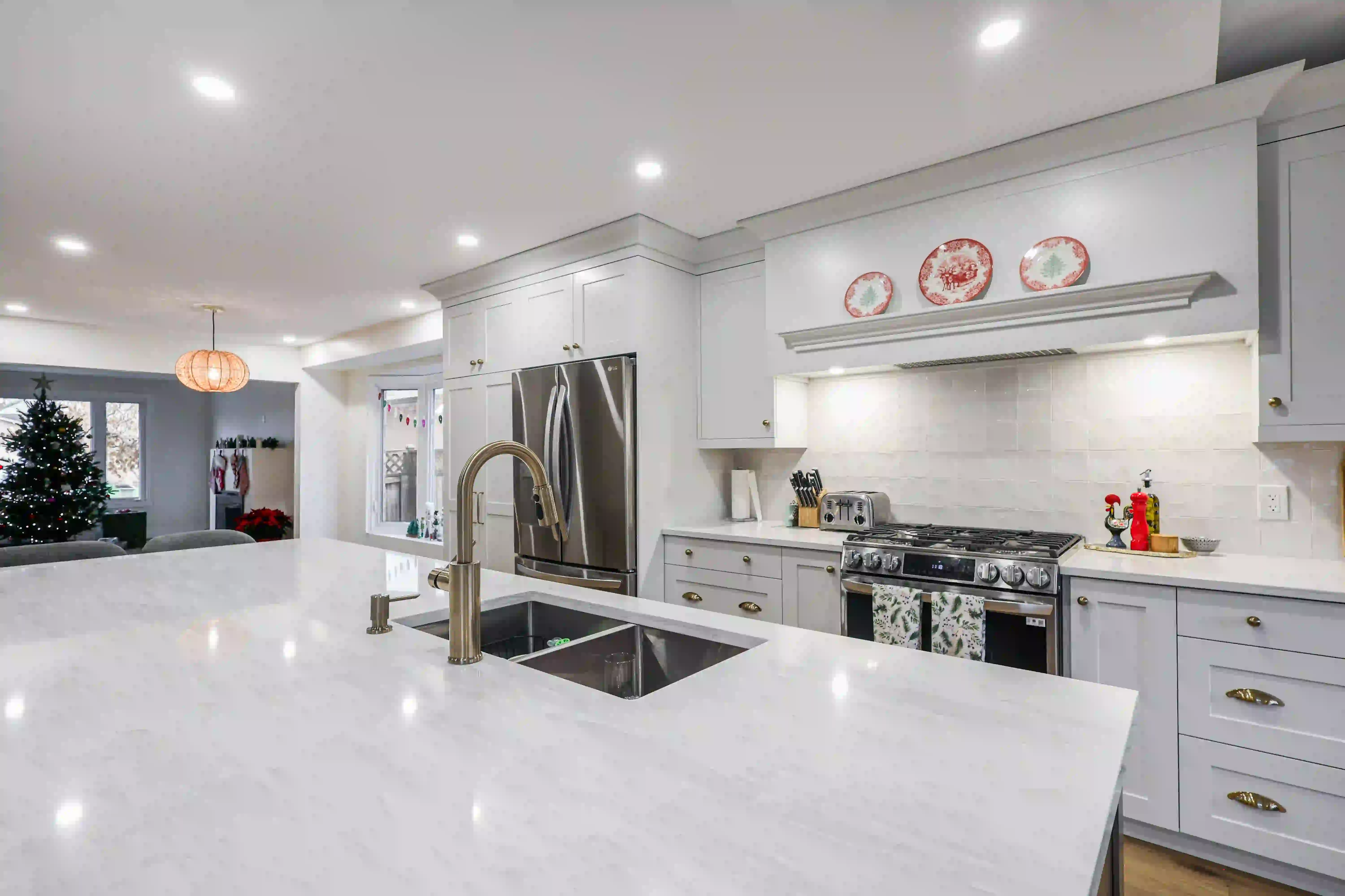 Kitchen island, sink and range view