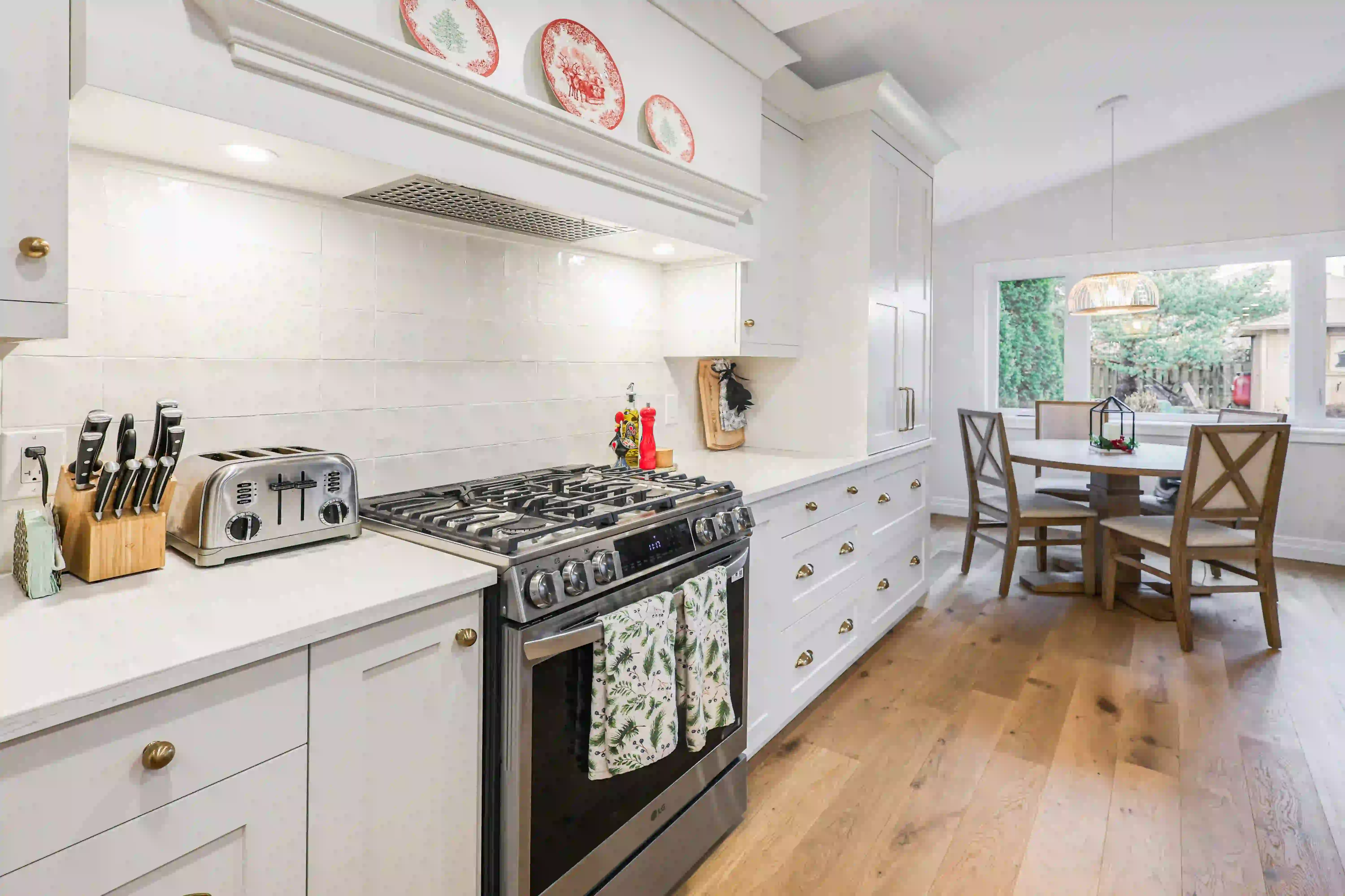 Kitchen range and white cabinetry