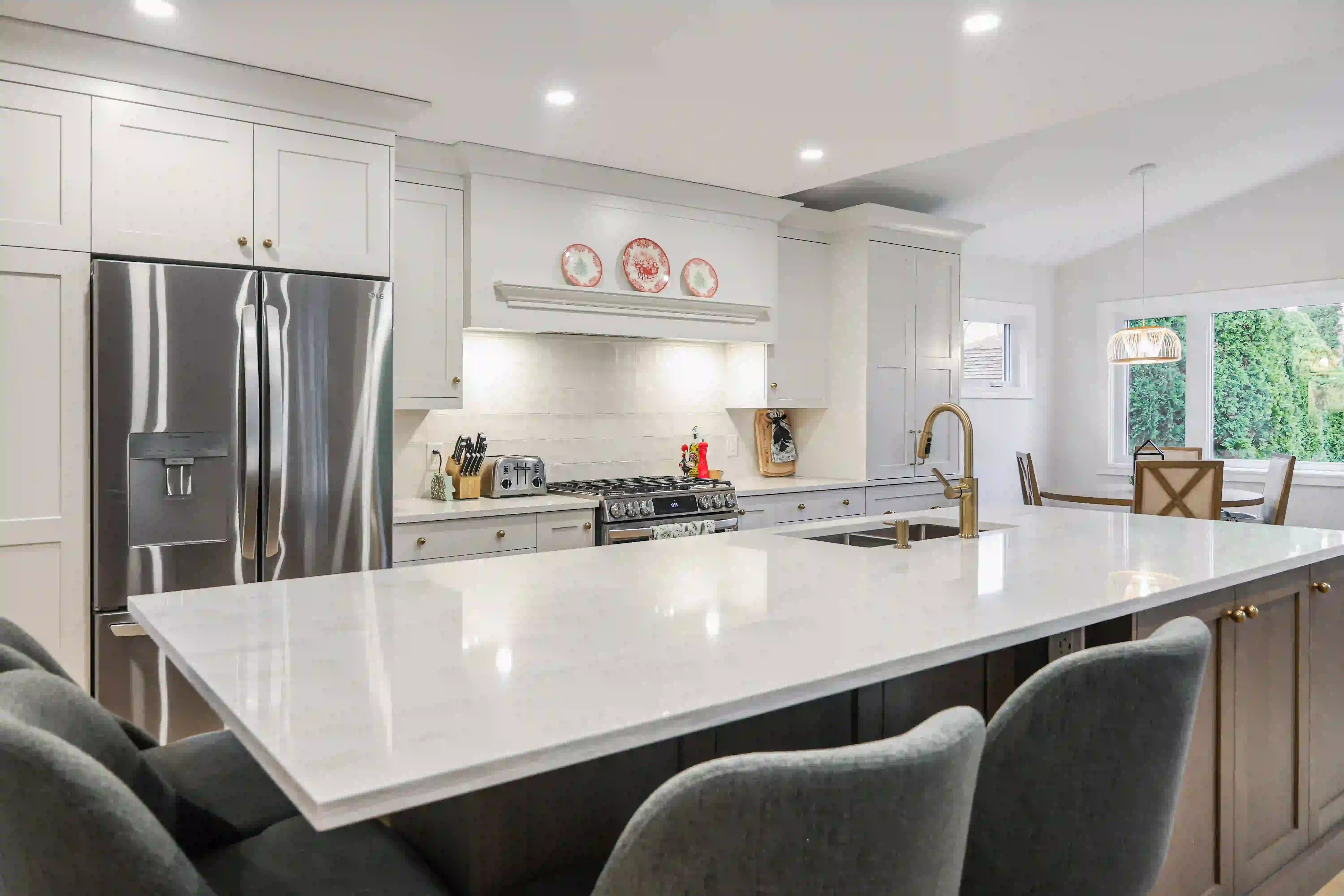 Kitchen island and refrigerator wall