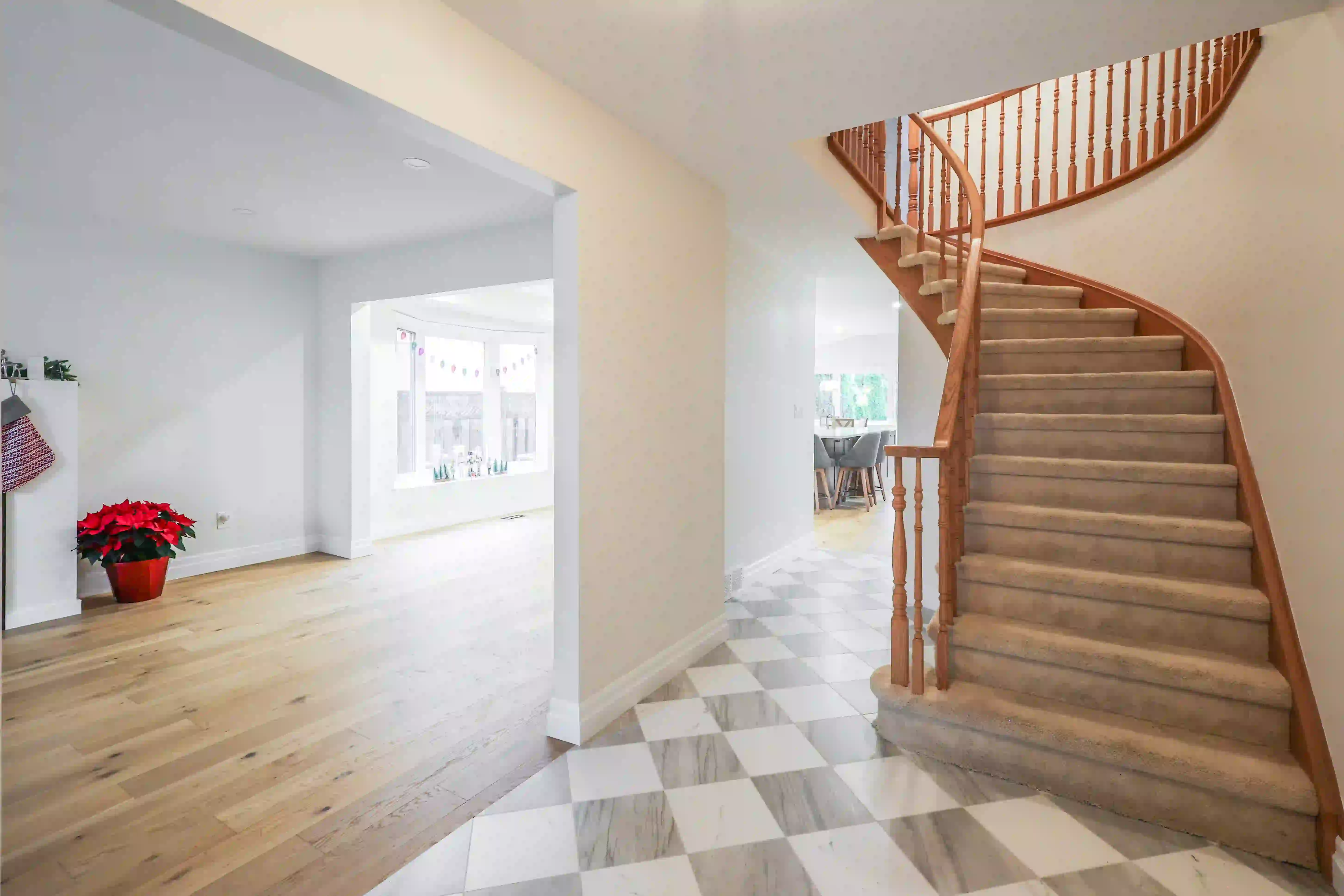 Foyer staircase and checkerboard floor