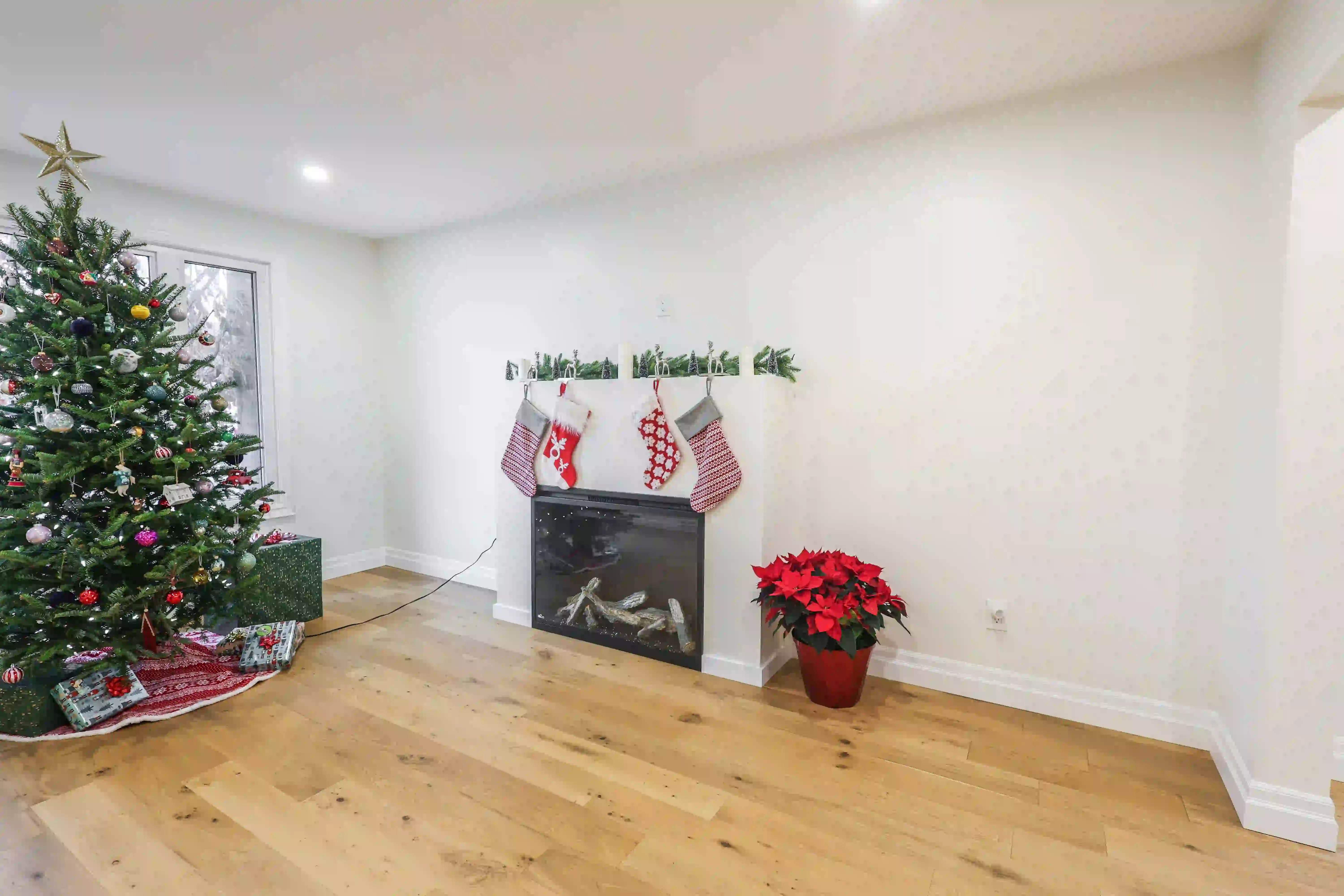 Living room fireplace and holiday decor