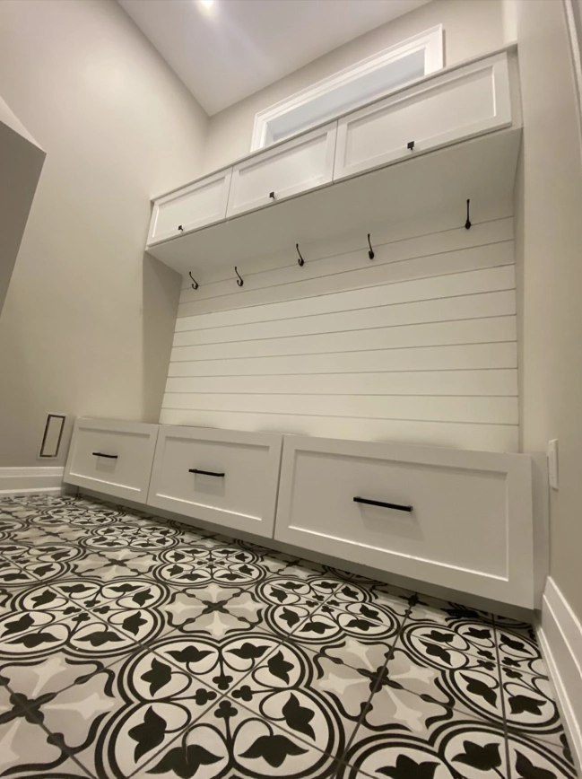 Mudroom bench and patterned floor tile