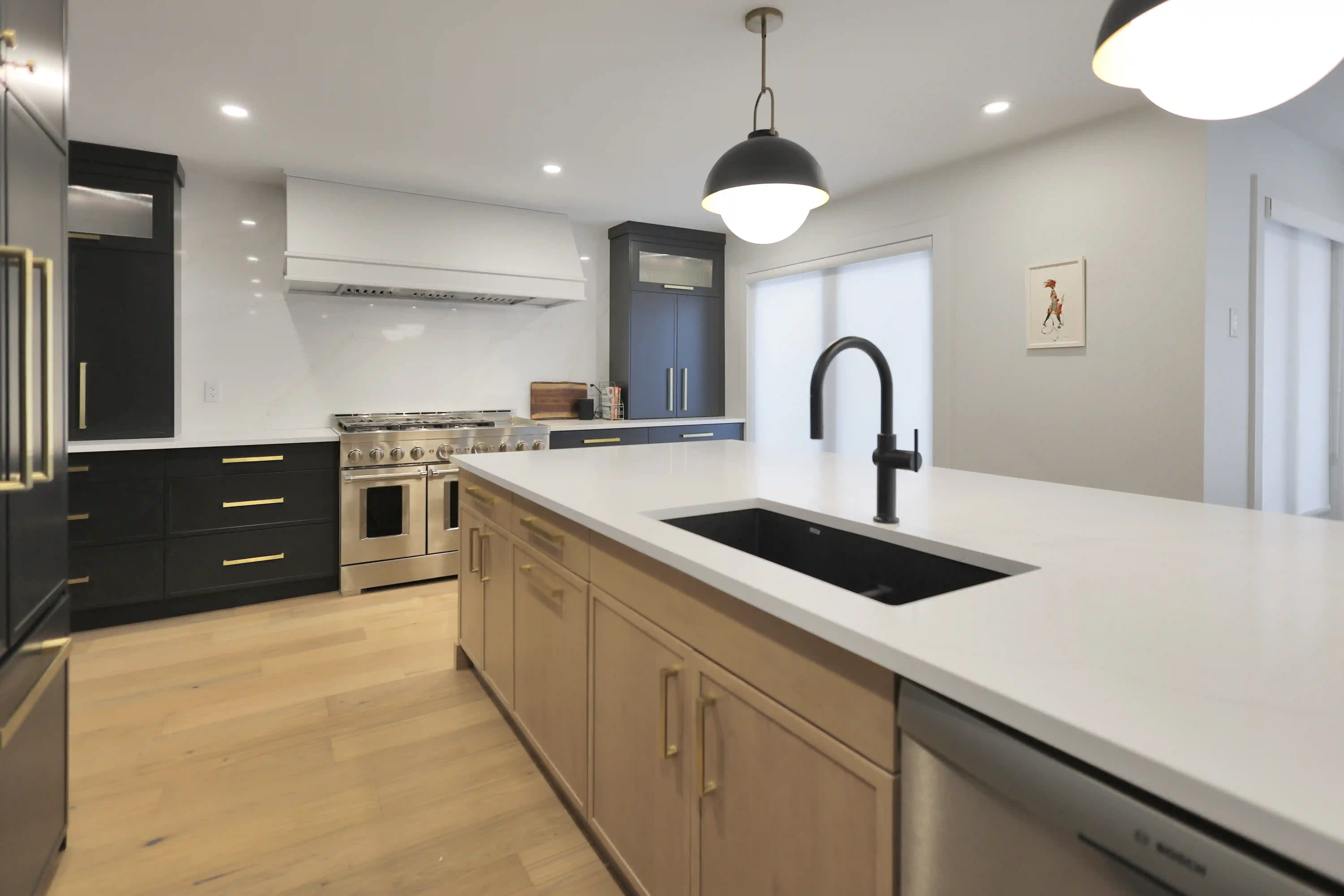 Kitchen island and black faucet