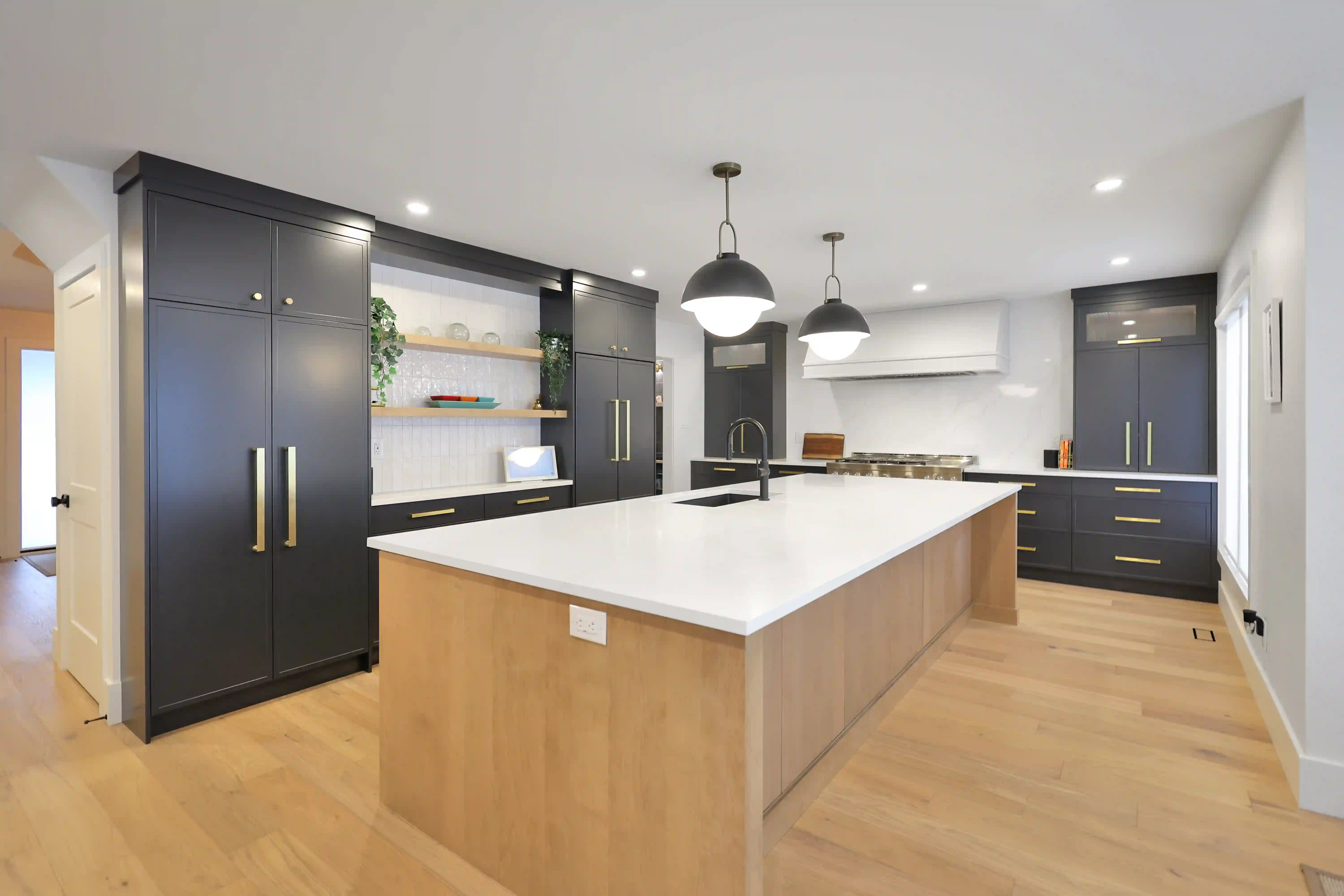 Kitchen island and cabinetry wall
