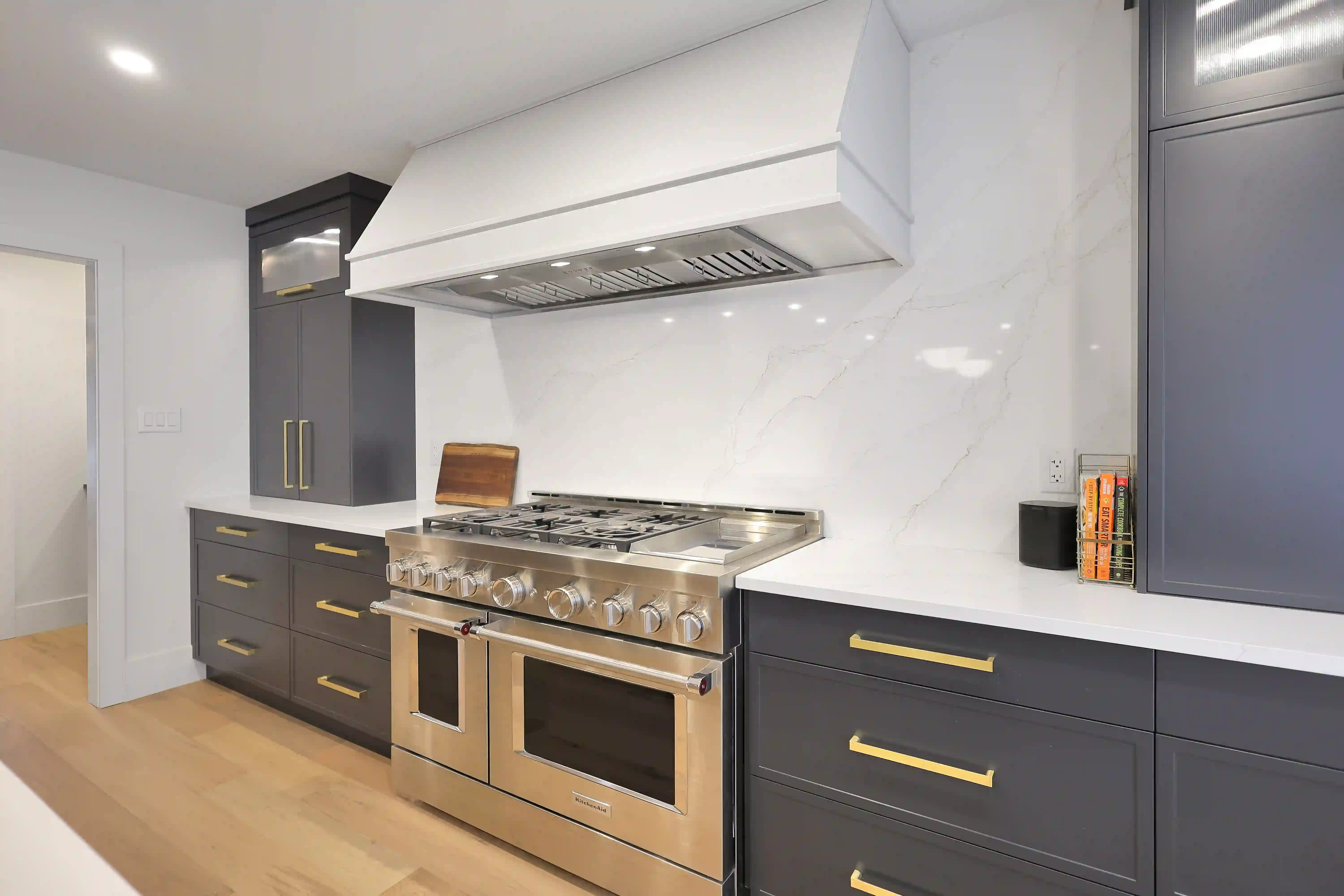 Range wall with black cabinetry
