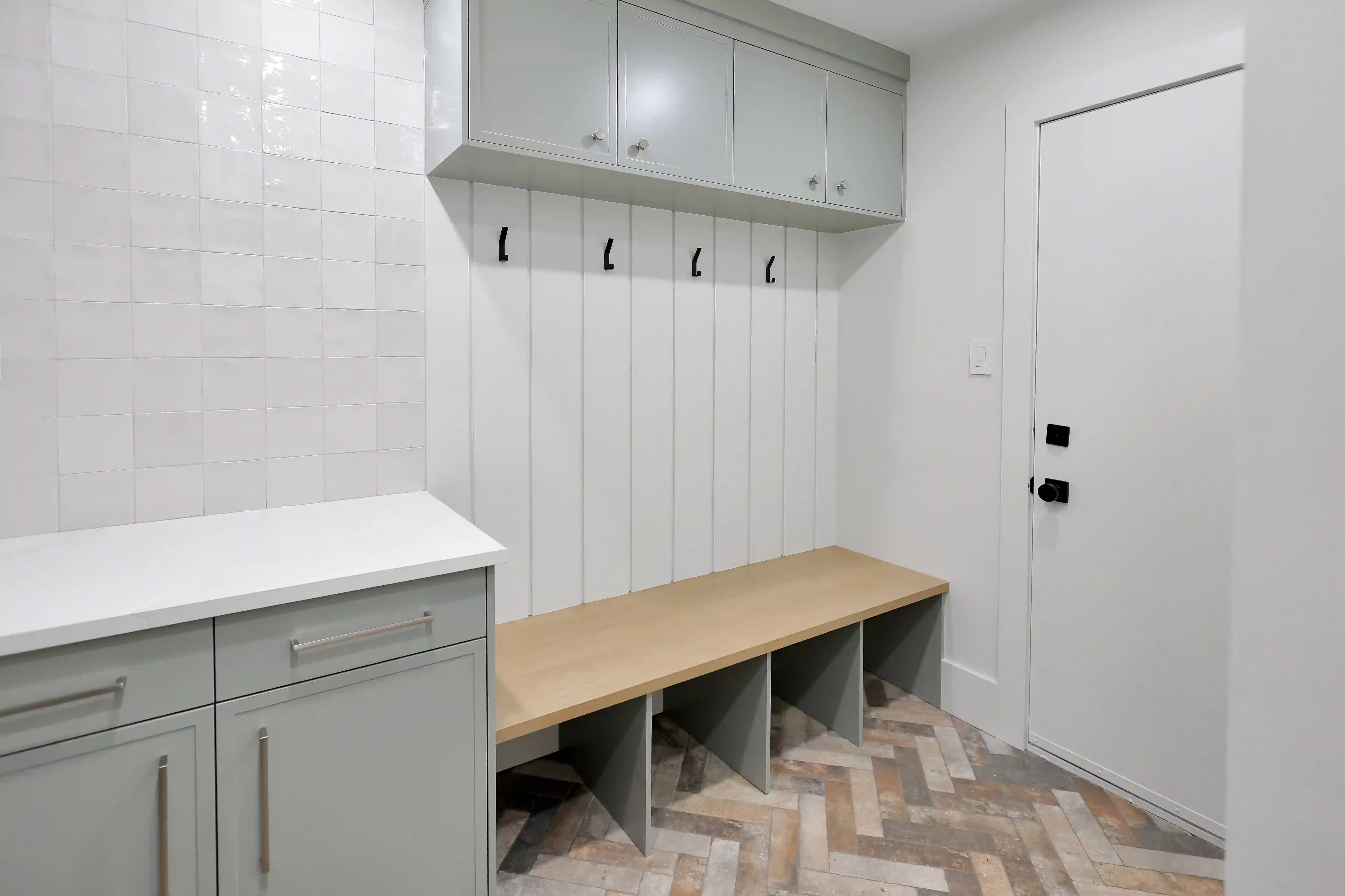 Mudroom storage and laundry cabinetry