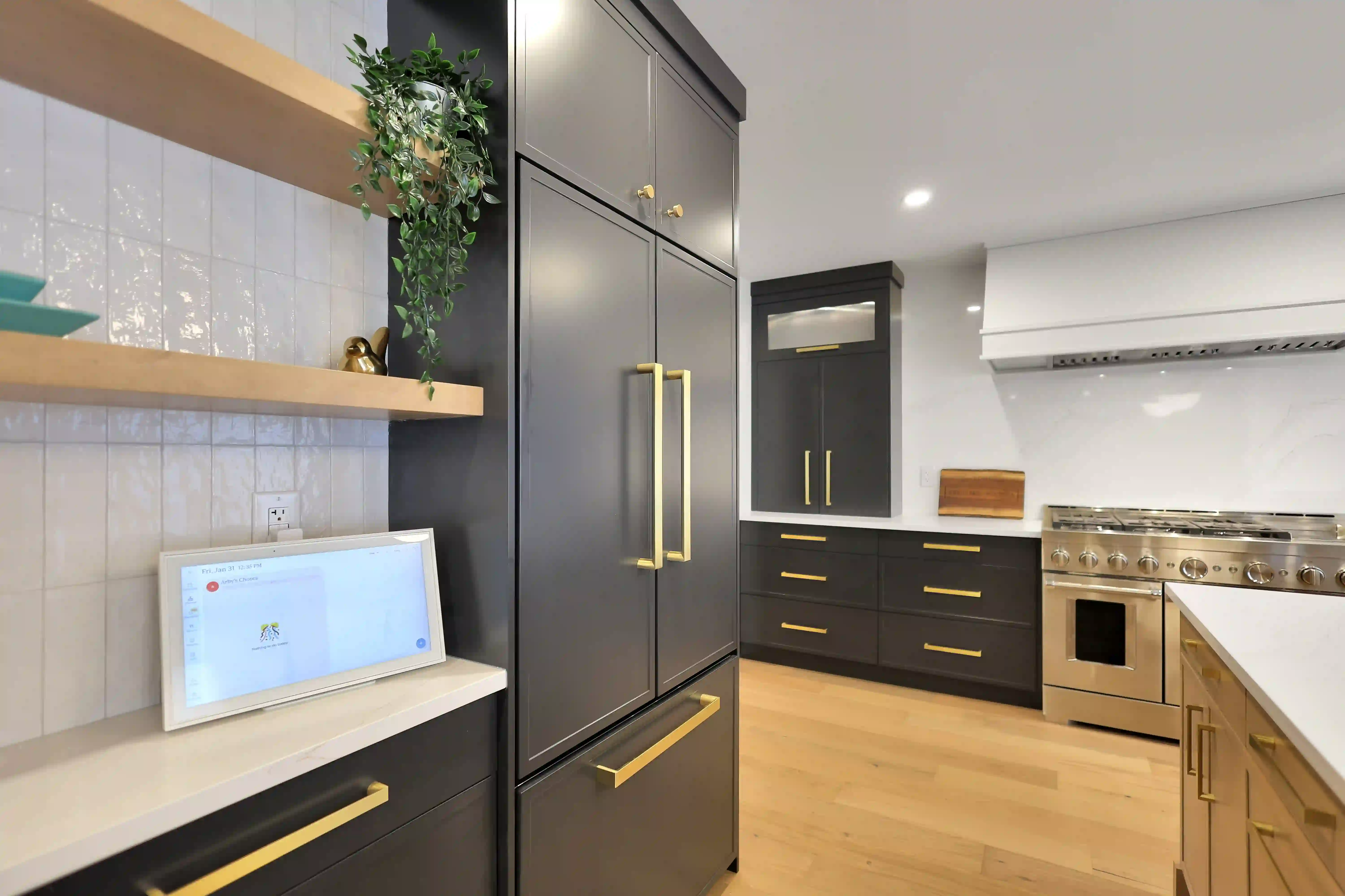 Kitchen desk nook and tall pantry cabinetry