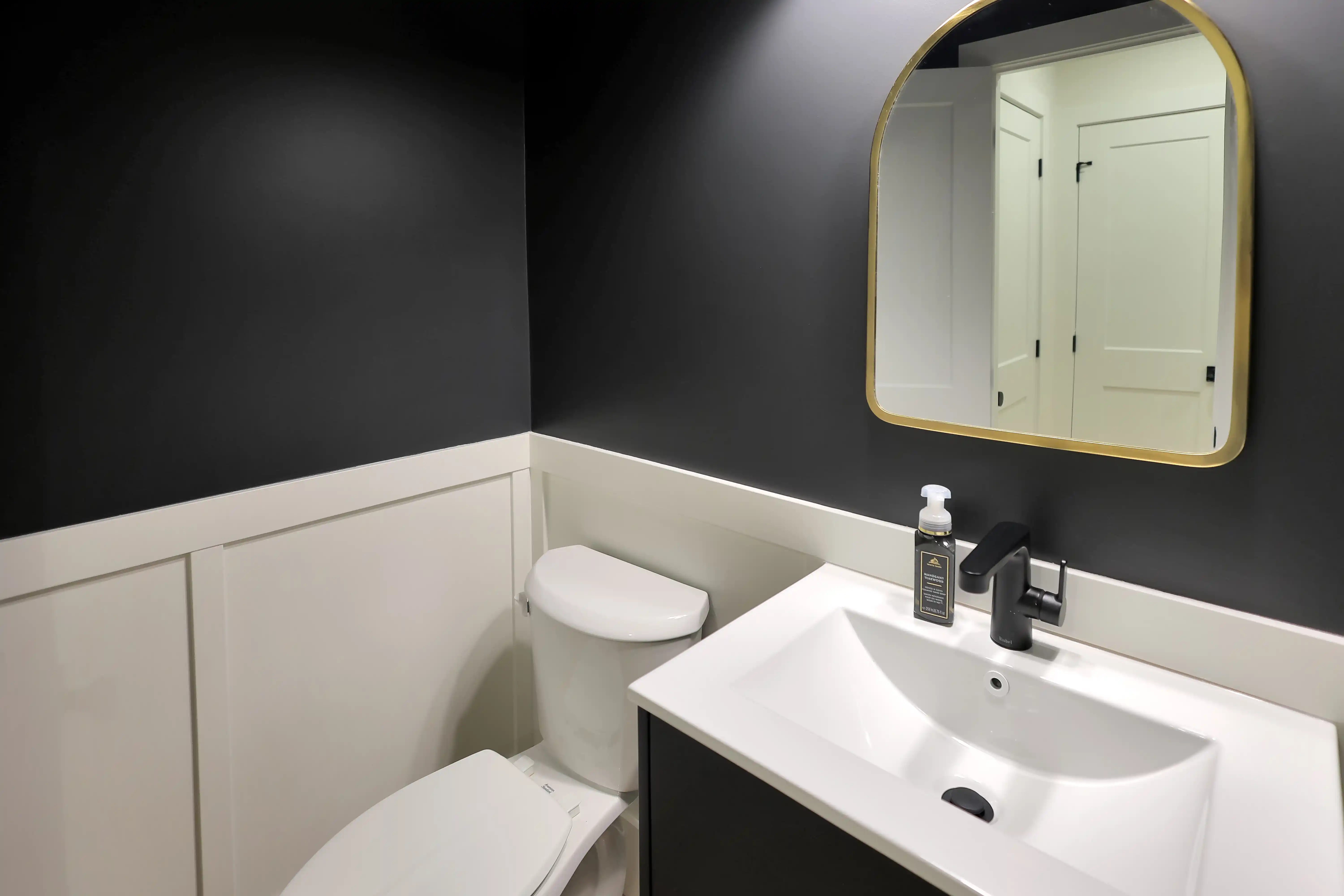 Powder room with wainscotting