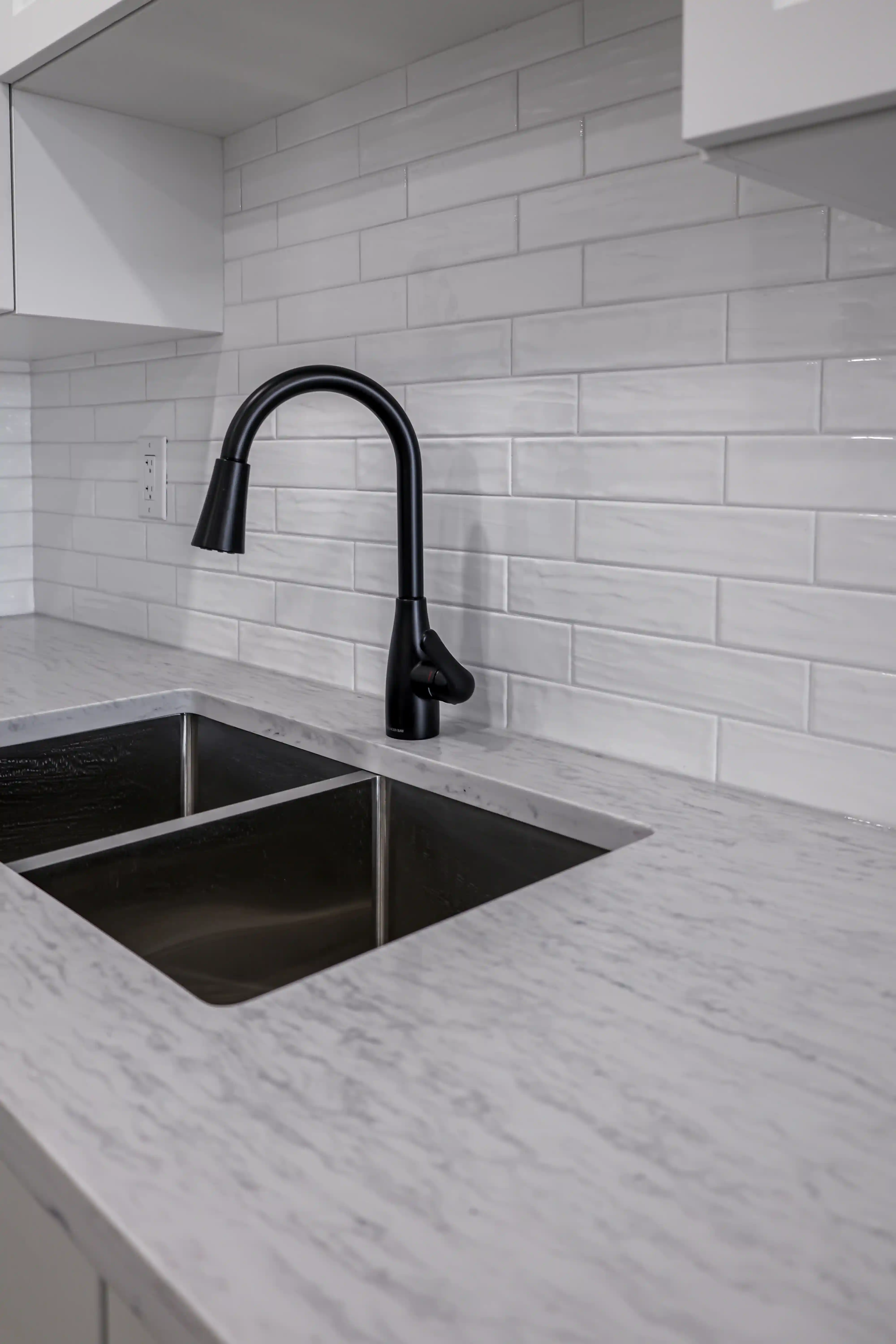 Black kitchen sink detail