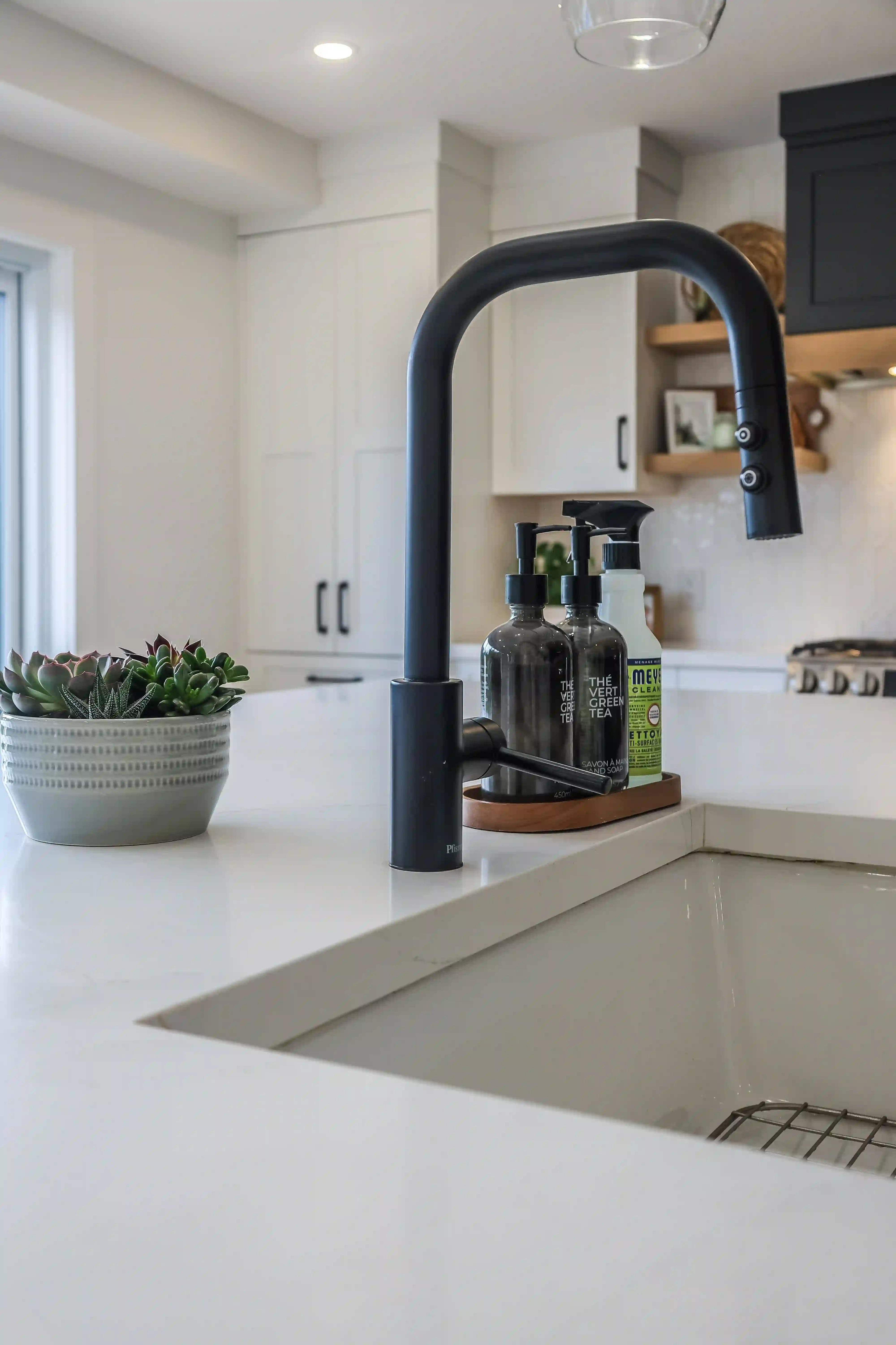 Kitchen sink and black faucet detail