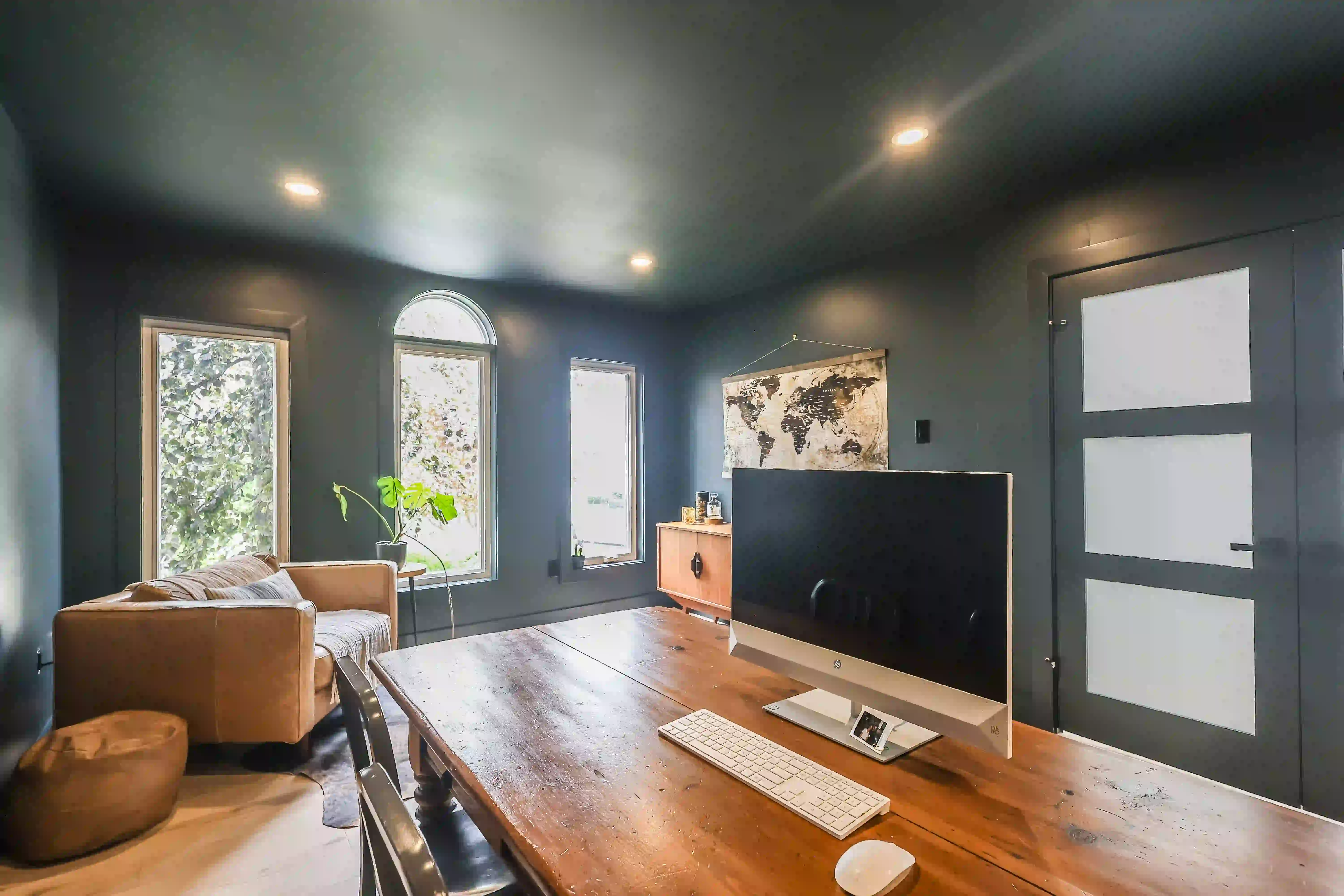 Home office with desk and lounge seating