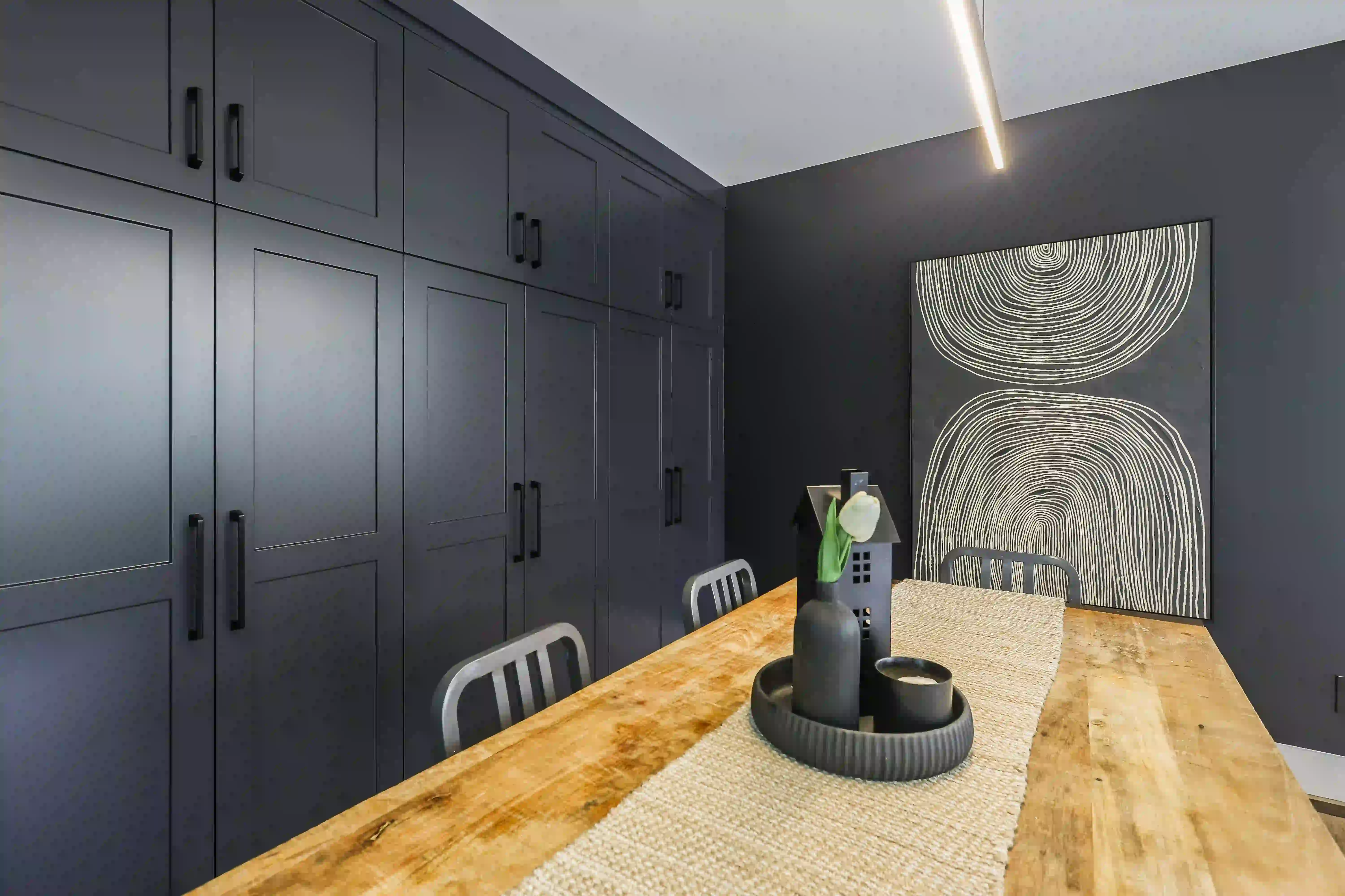Dining room cabinetry and feature wall