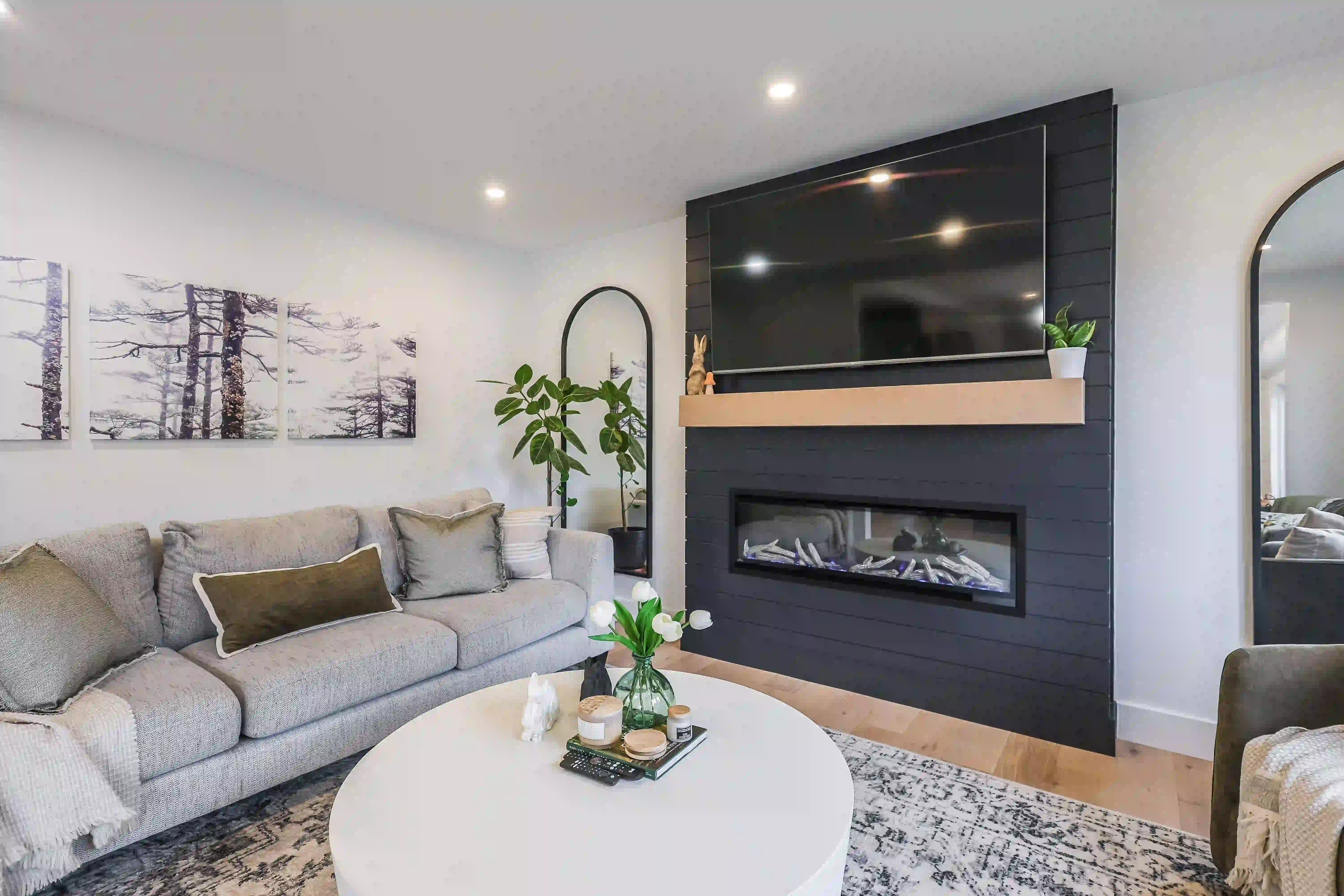 Living room with fireplace feature wall