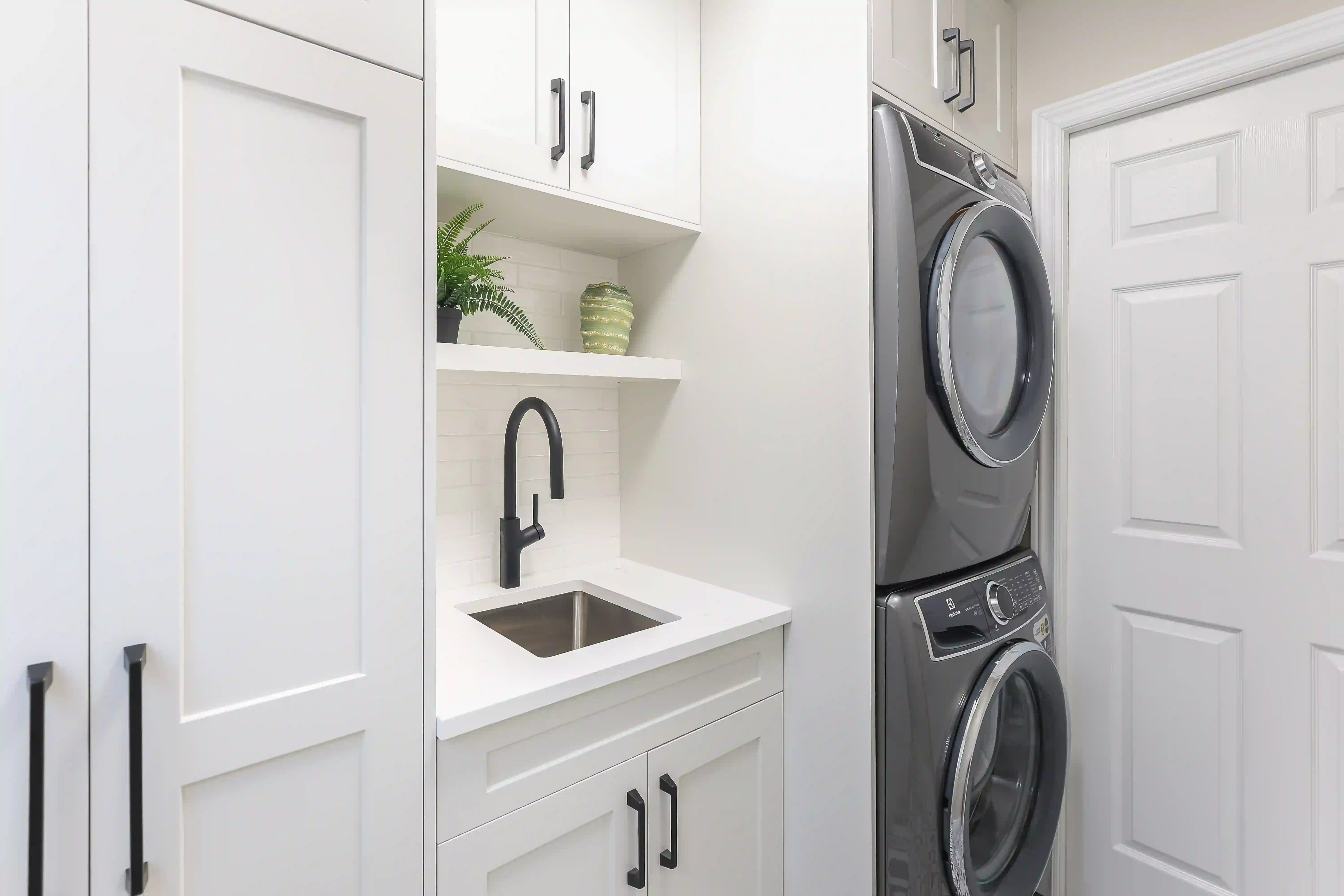 Laundry sink and tall storage cabinet