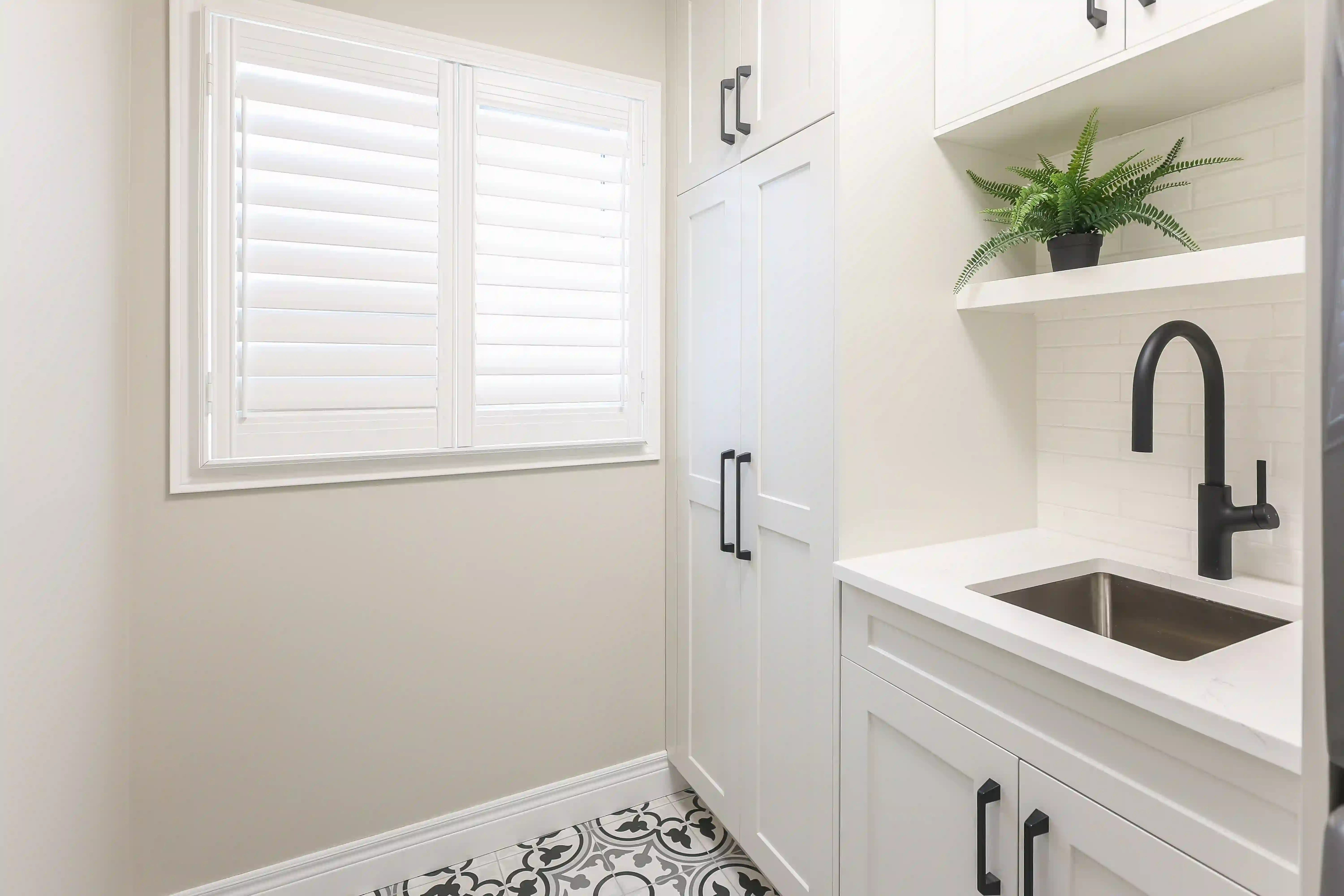 Laundry room window and storage